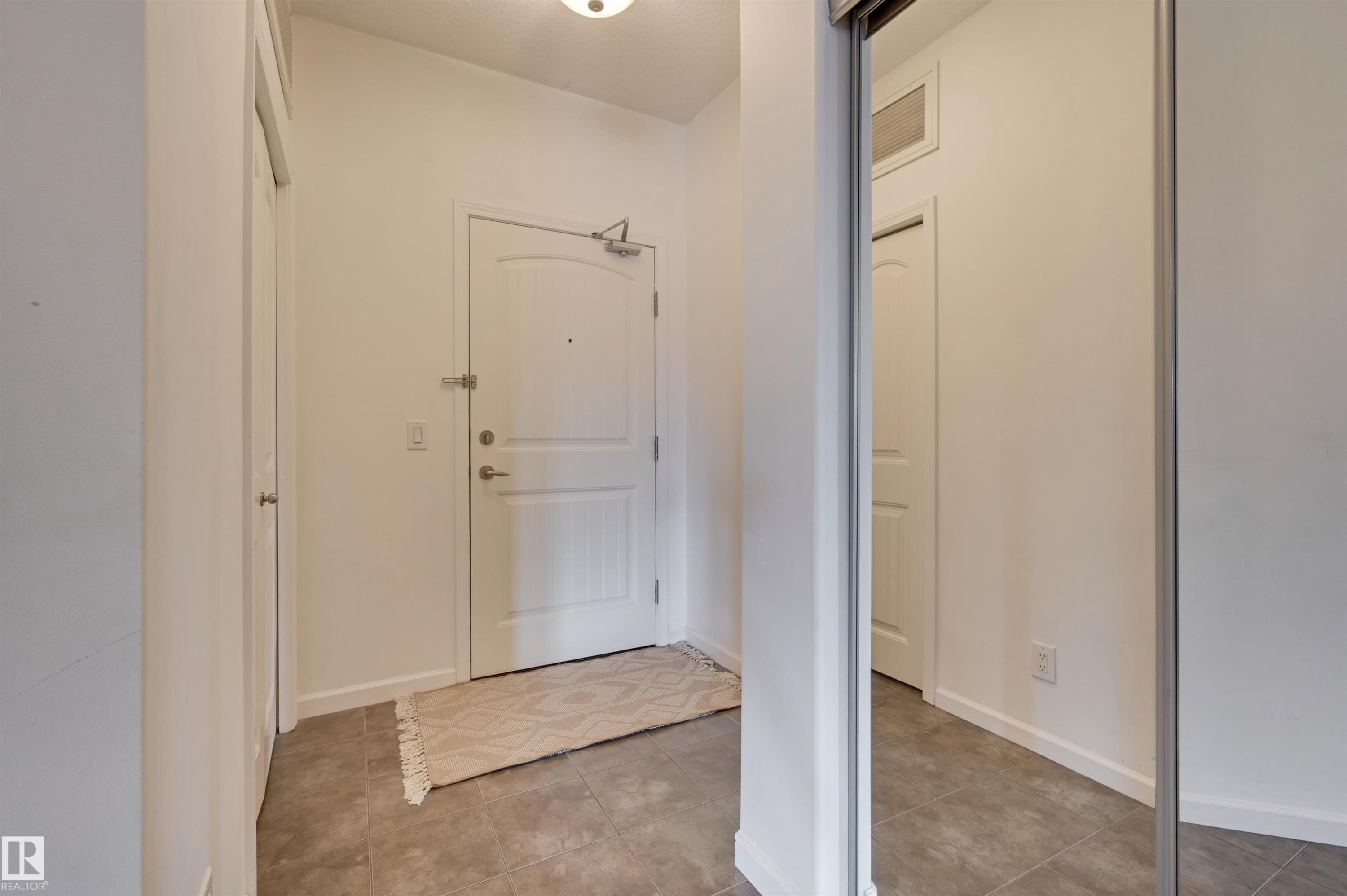 221 6083 Maynard Way, Edmonton, AB - Indoor Photo Showing Other Room