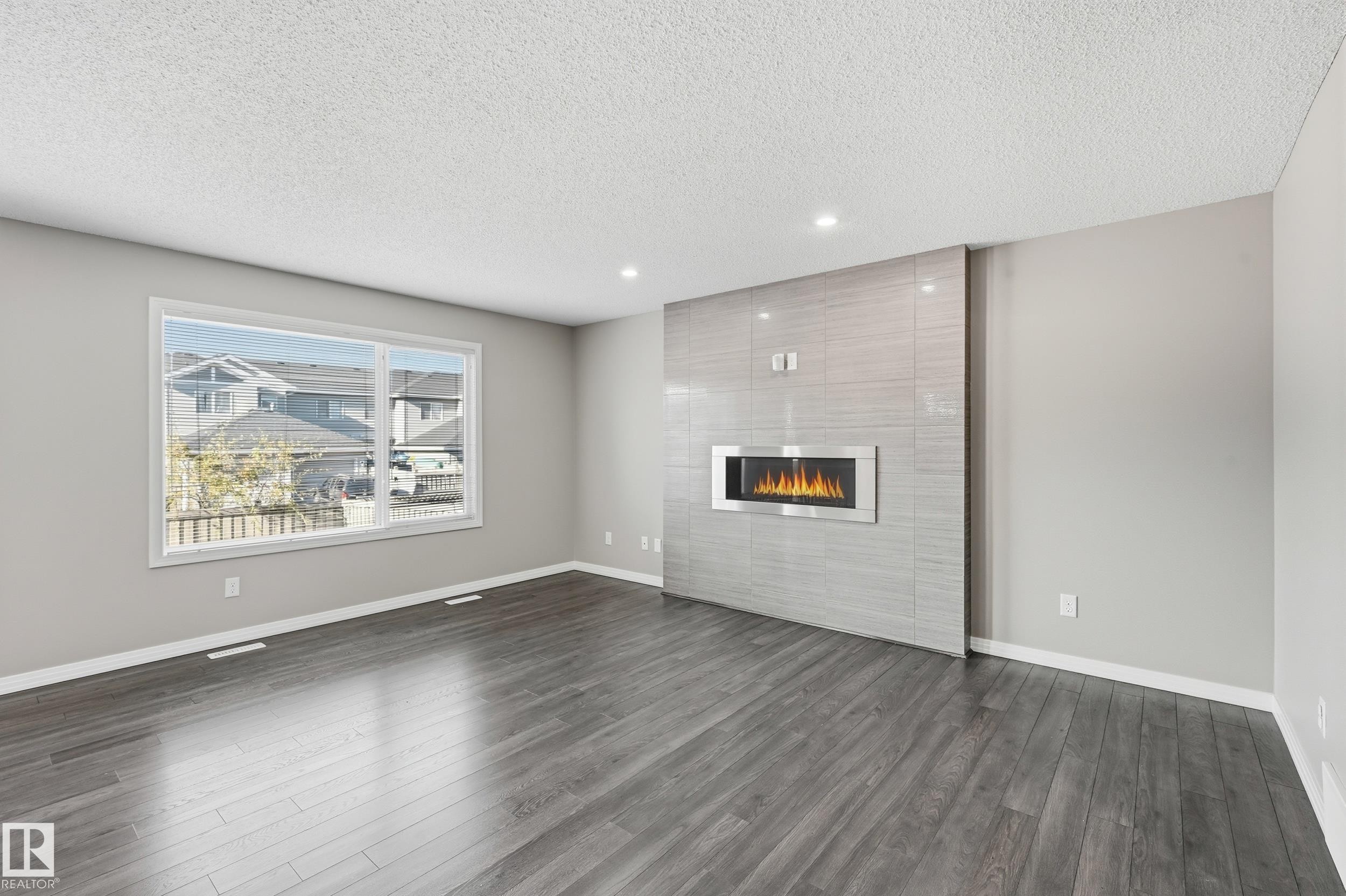 3528 Claxton Crescent, Edmonton, AB - Indoor Photo Showing Living Room With Fireplace