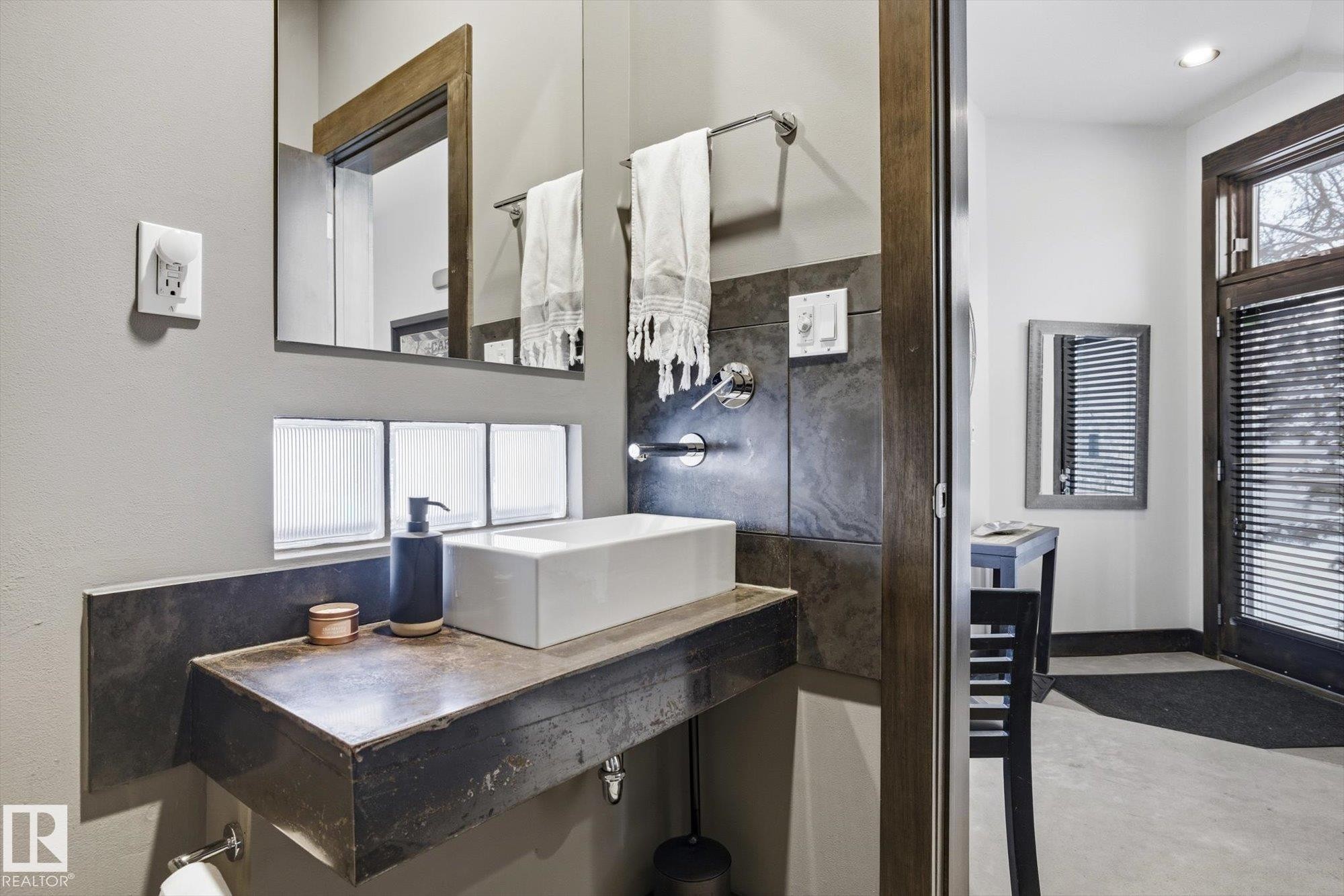 Bathroom featuring vanity and concrete flooring - 9012 98 Street, Edmonton, AB - Indoor