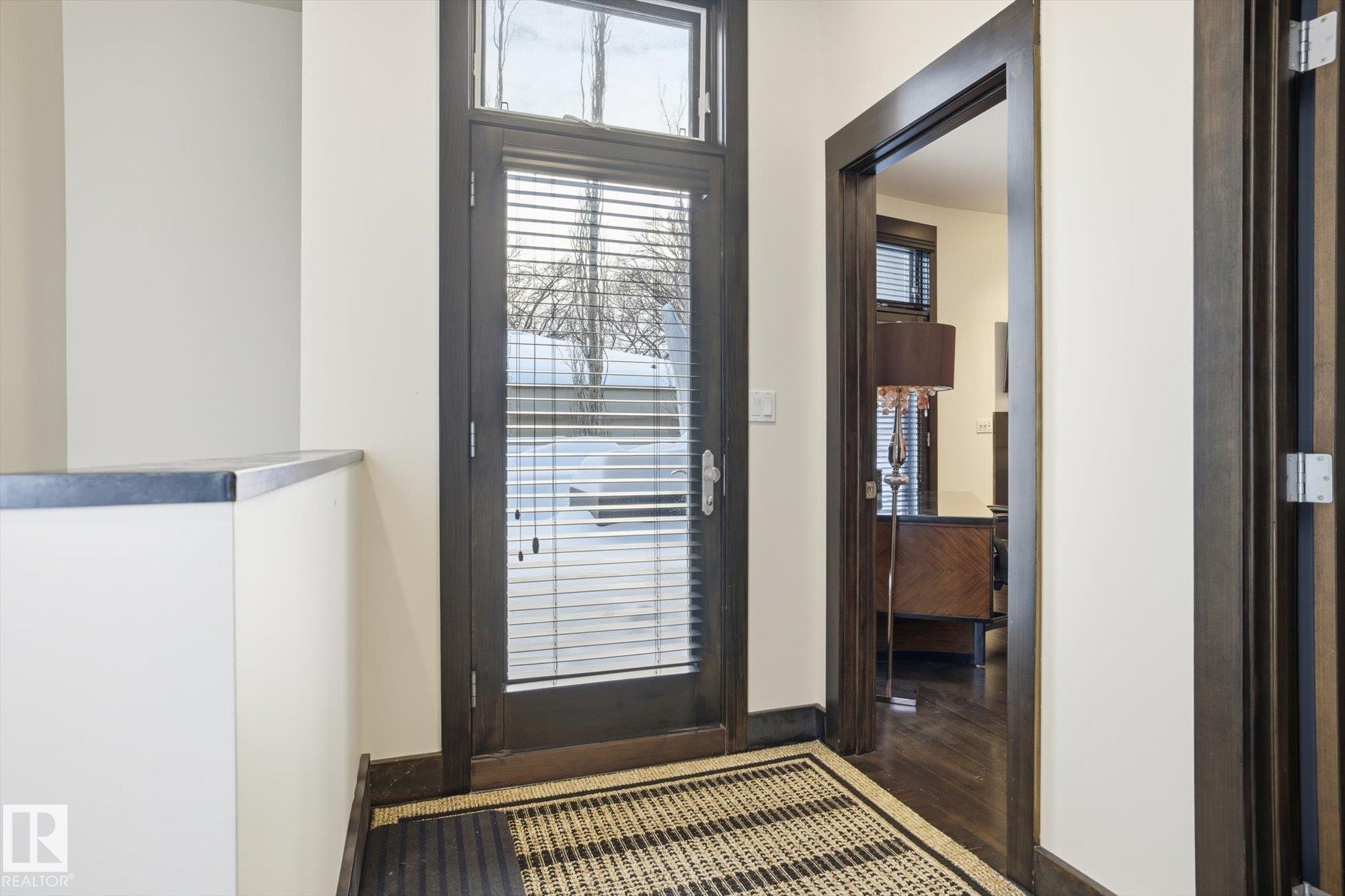Doorway featuring healthy amount of natural light and wood finished floors - 9012 98 Street, Edmonton, AB - Indoor Photo Showing Other Room