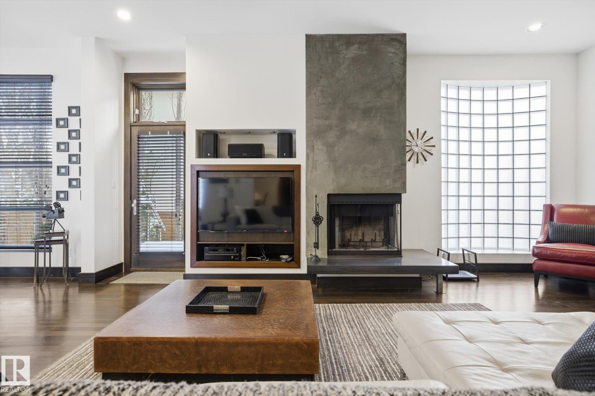 Living area featuring recessed lighting, a large fireplace, and dark wood finished floors - 9012 98 Street, Edmonton, AB - Indoor Photo Showing Living Room With Fireplace