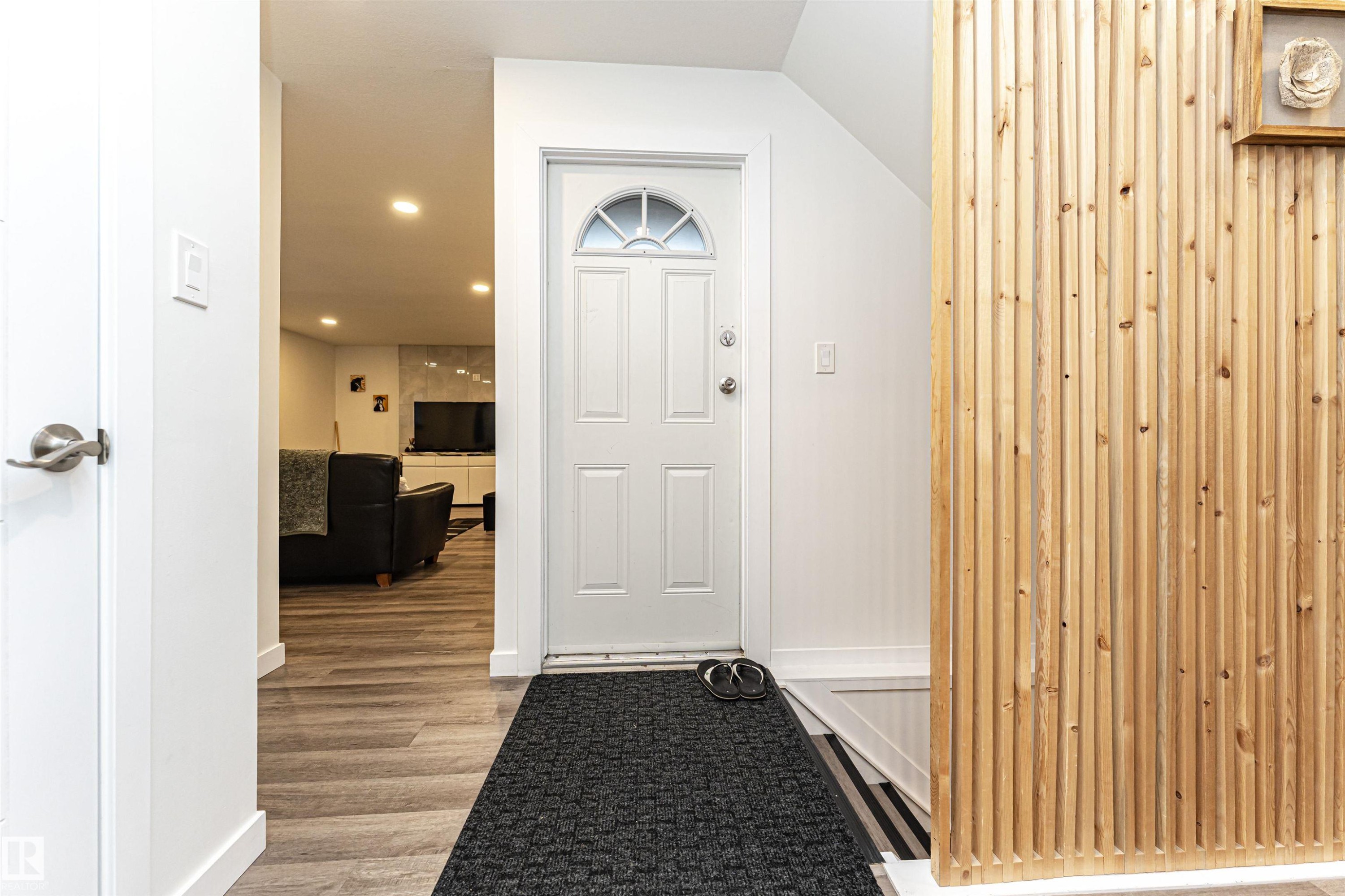 Entryway with light wood finished floors and recessed lighting - 17716 84 Avenue, Edmonton, AB - Indoor Photo Showing Other Room