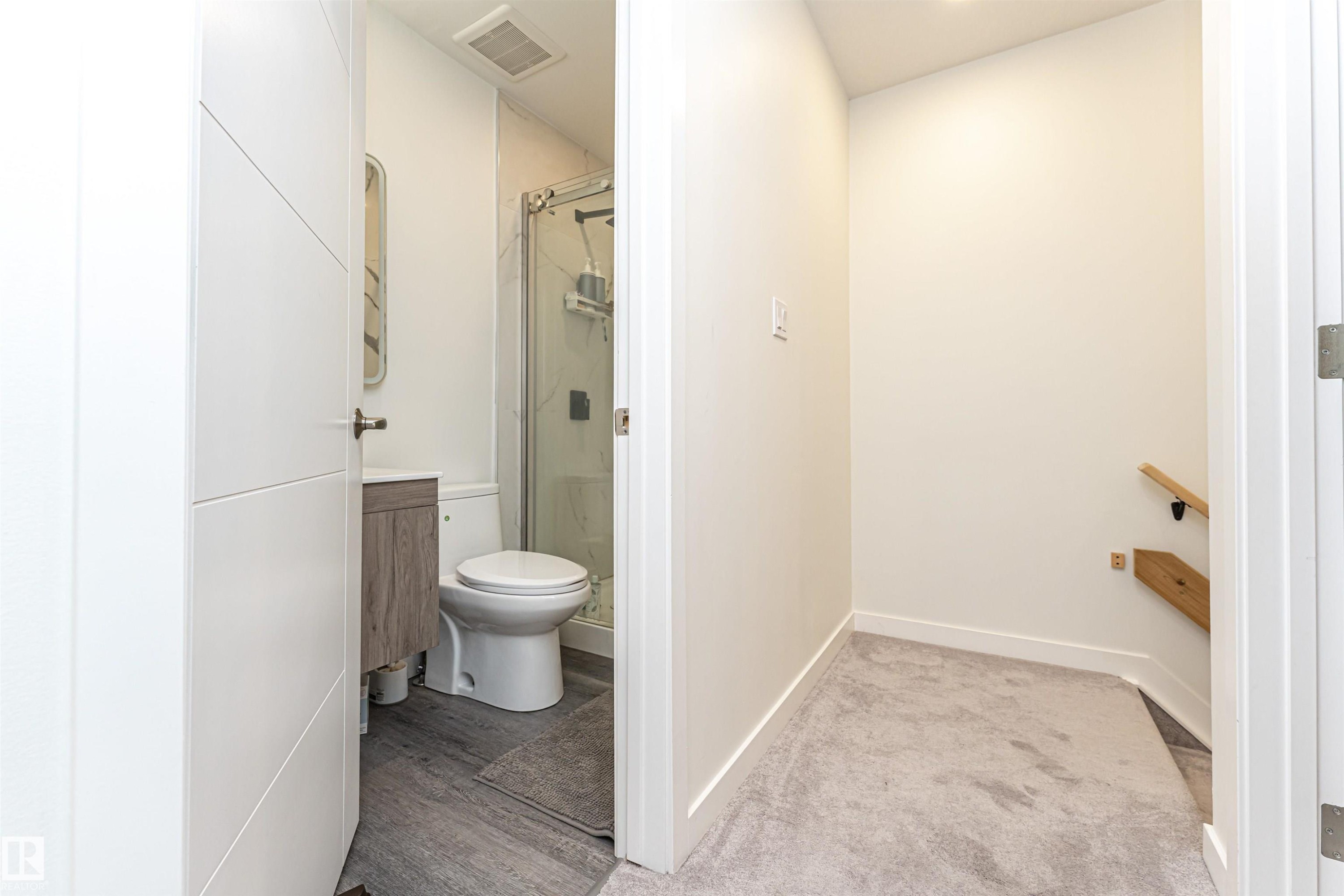 Full bathroom with vanity and a stall shower - 17716 84 Avenue, Edmonton, AB - Indoor Photo Showing Bathroom