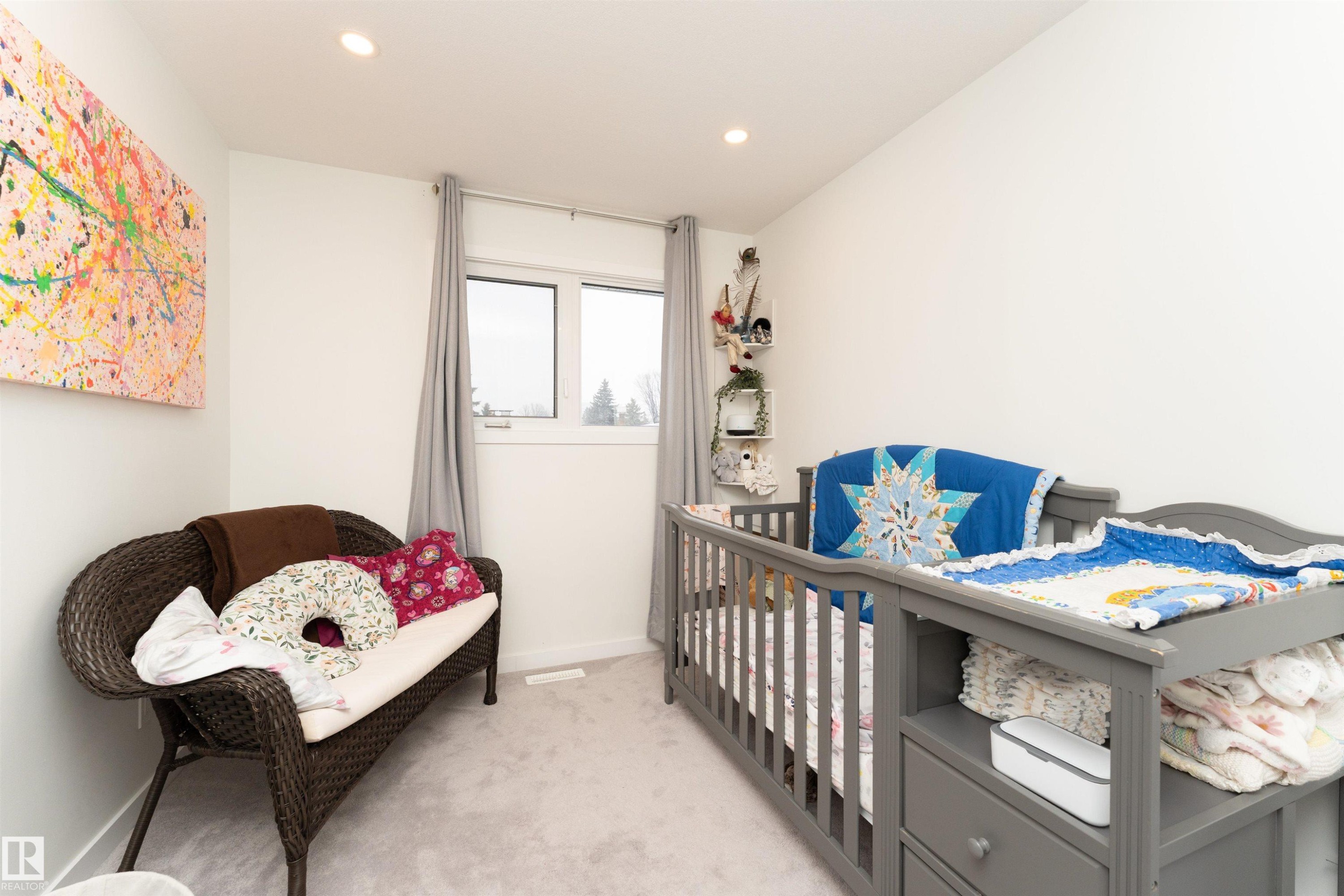Bedroom featuring light colored carpet and recessed lighting - 17716 84 Avenue, Edmonton, AB - Indoor