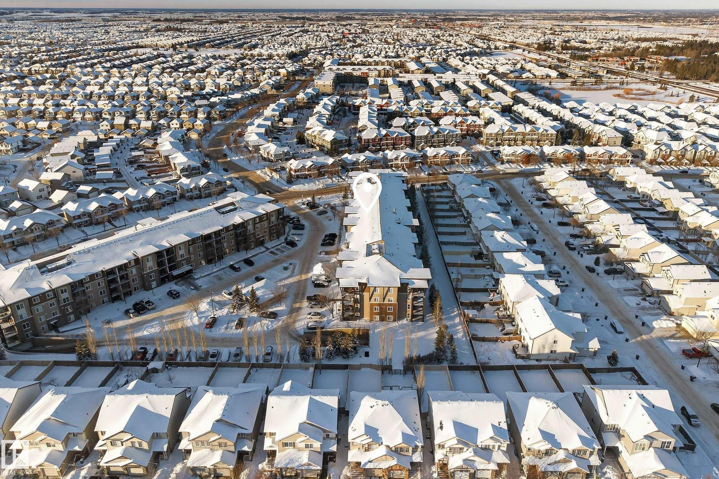 Aerial overview of property's location with nearby suburban area - 108 534 Watt Boulevard, Edmonton, AB - Outdoor With View