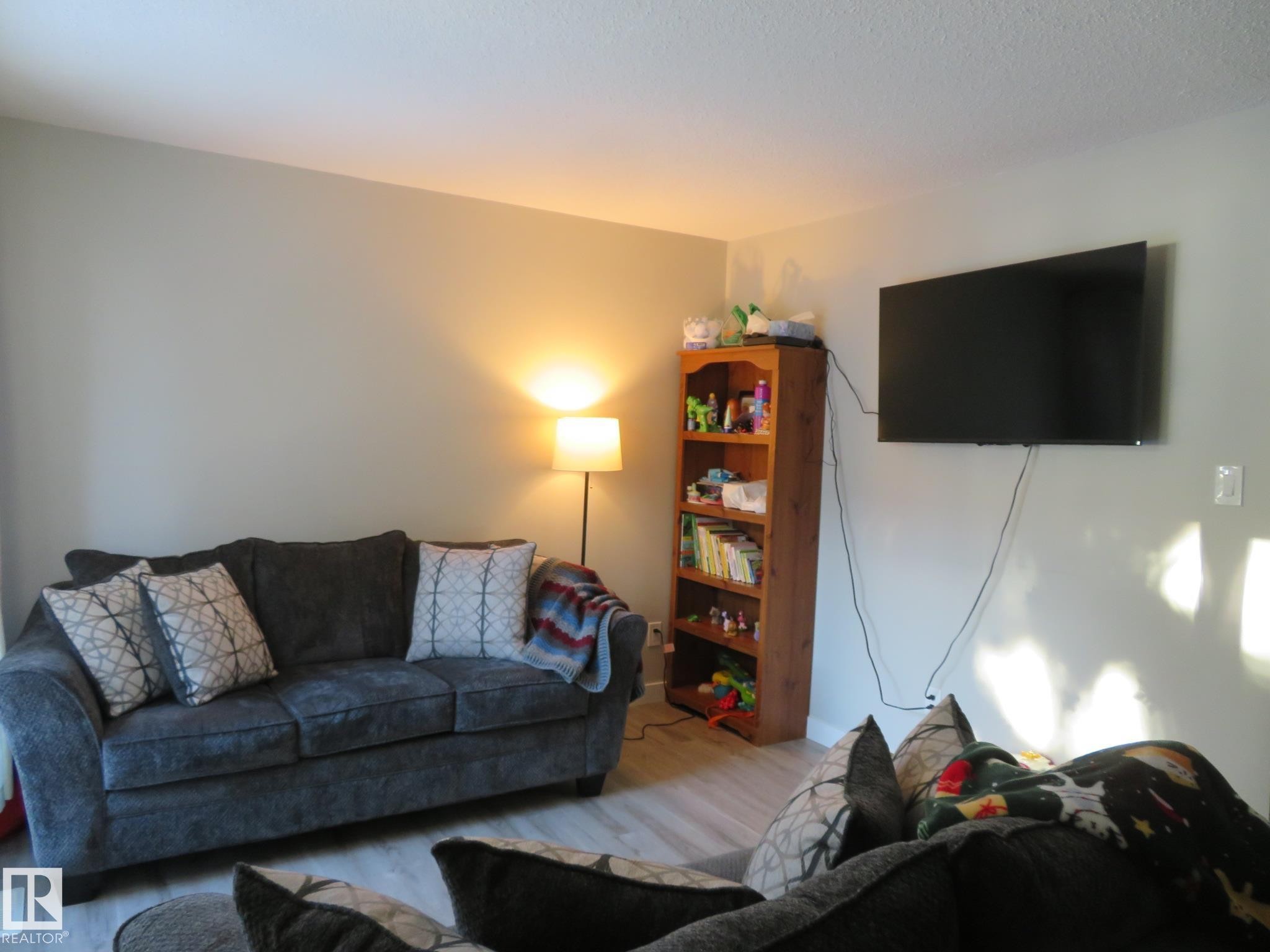 Living room with wood finished floors - 3103 109 Street, Edmonton, AB - Indoor Photo Showing Living Room