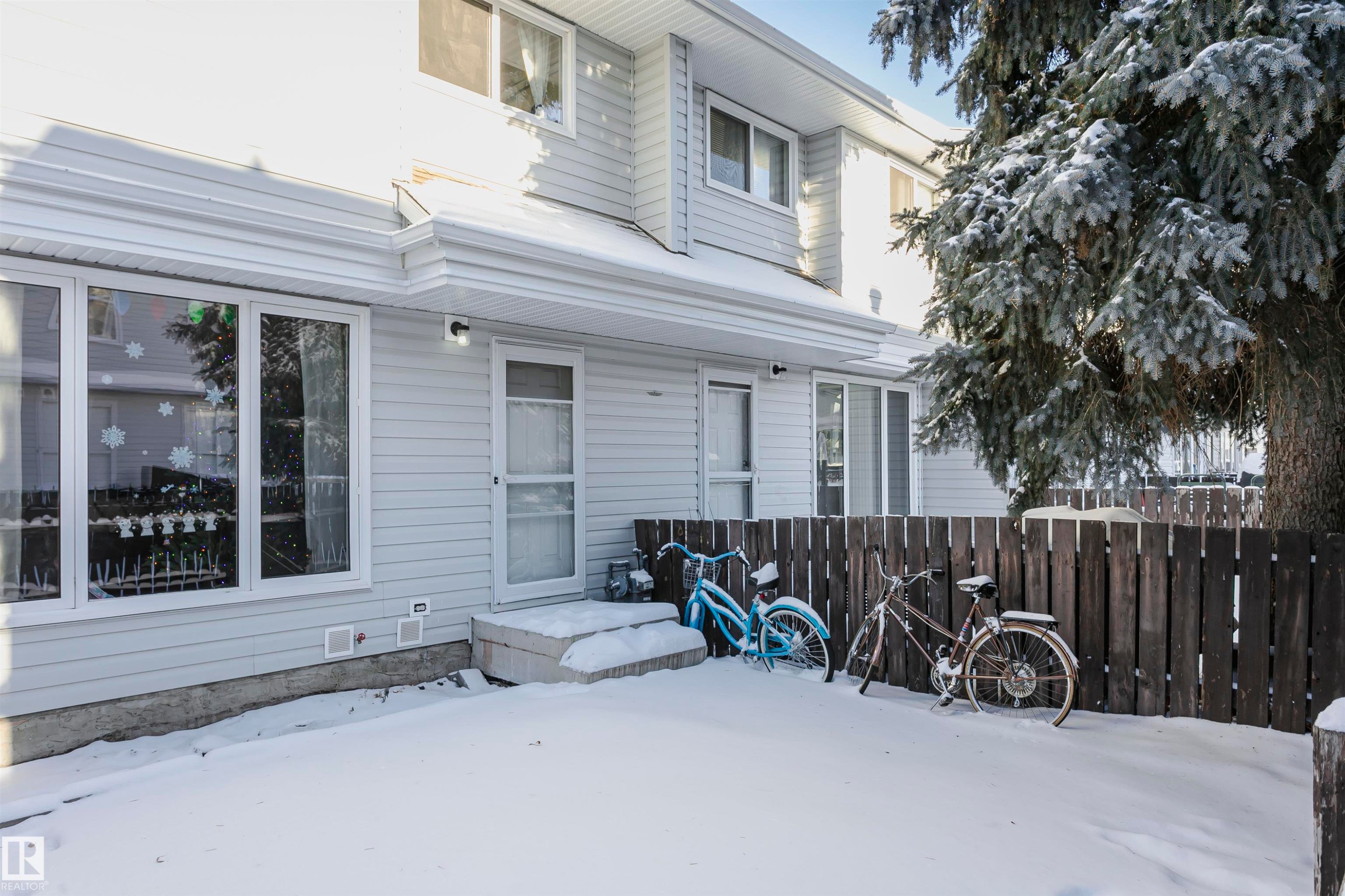 View of snow covered back of property - 3103 109 Street, Edmonton, AB - Outdoor With Exterior