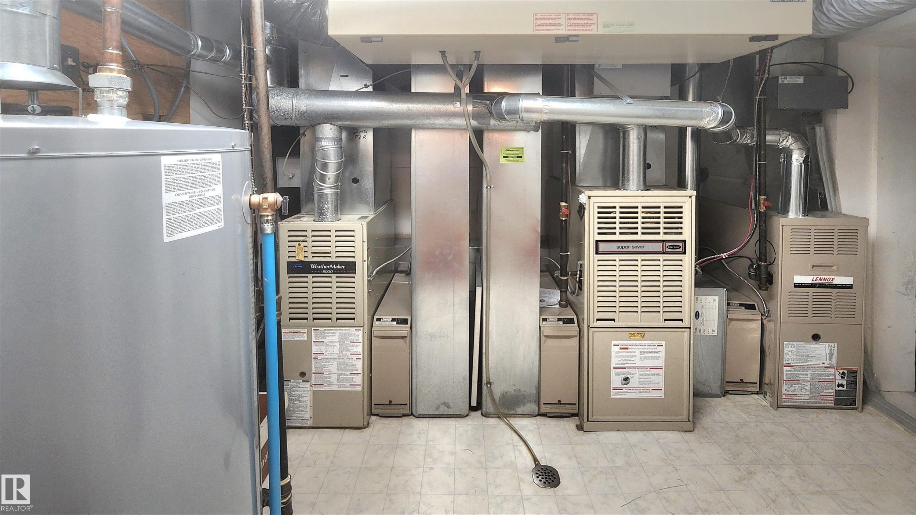 Utilities featuring heating unit - 6508 109 Avenue, Edmonton, AB - Indoor Photo Showing Basement