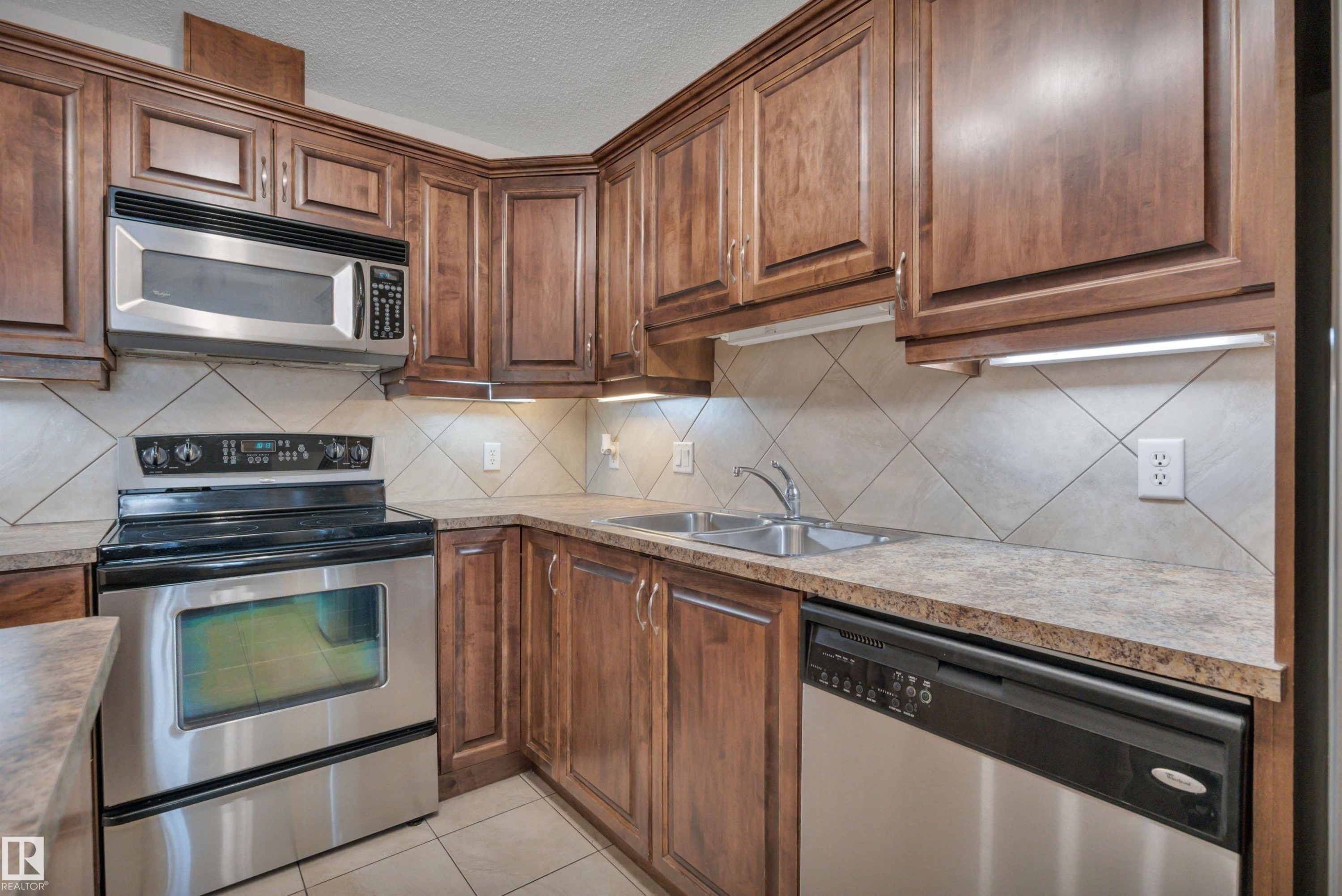 119 16035 132 Street, Edmonton, AB - Indoor Photo Showing Kitchen With Double Sink