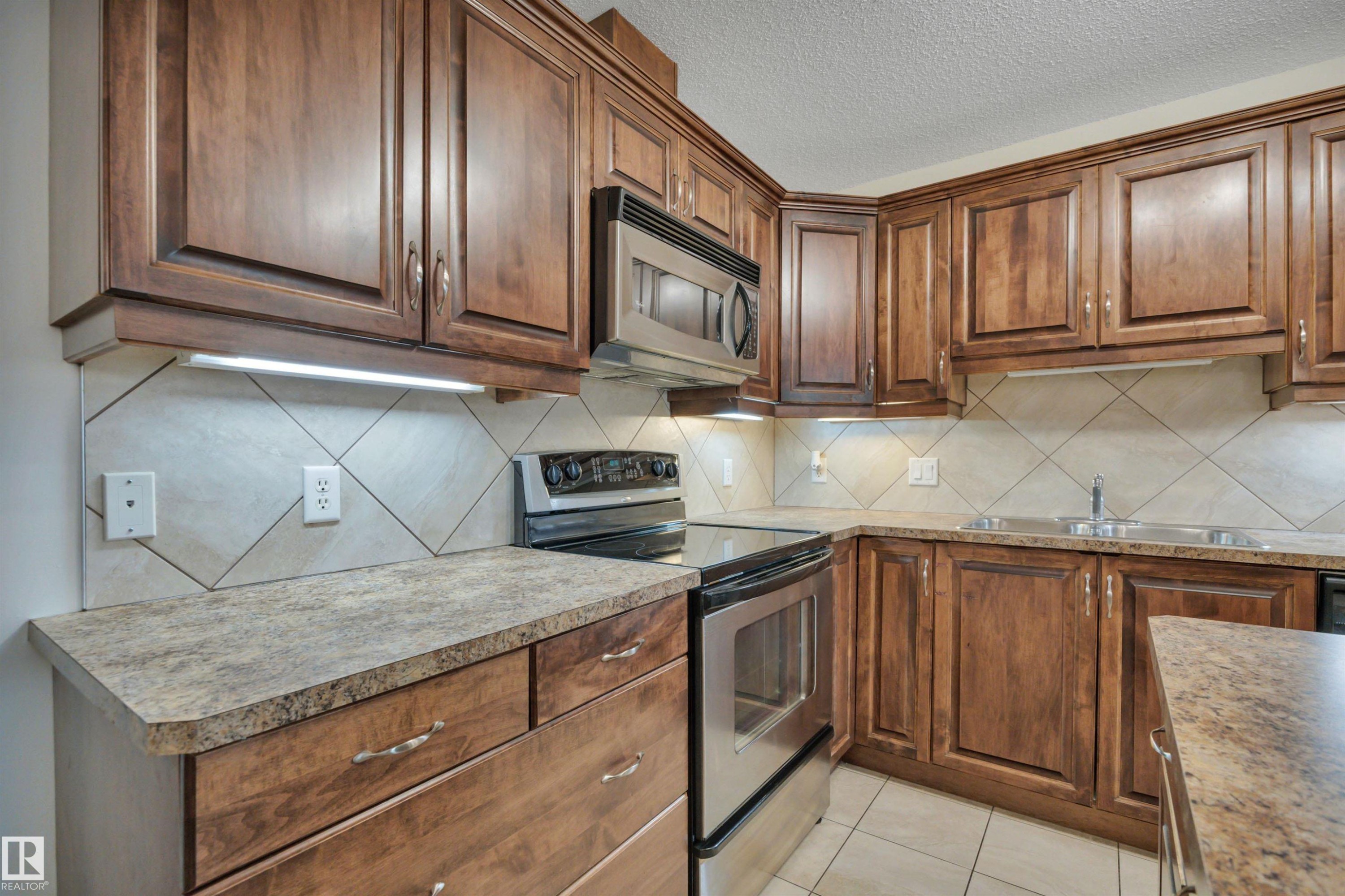 119 16035 132 Street, Edmonton, AB - Indoor Photo Showing Kitchen With Double Sink