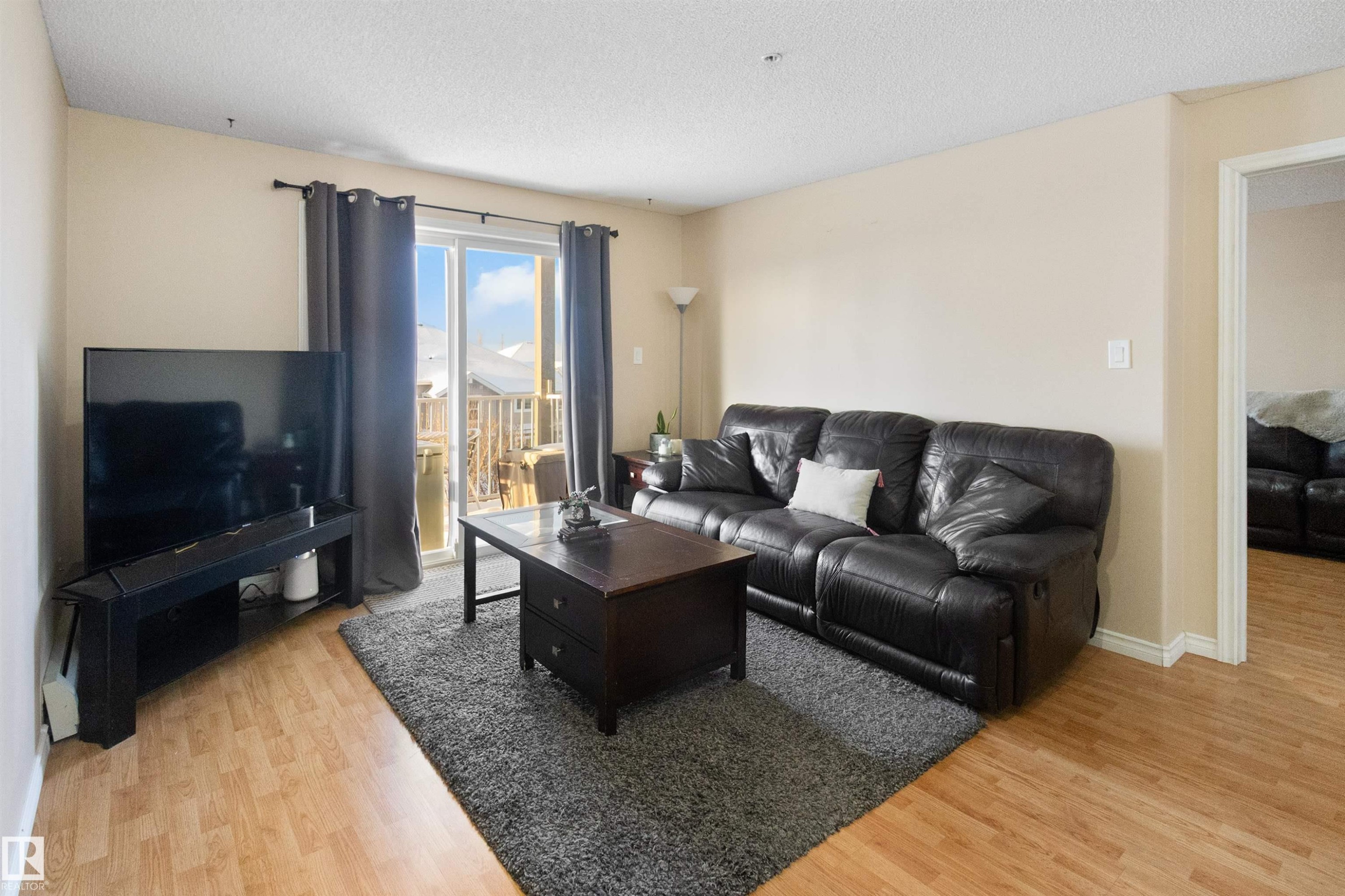 312 155 Edwards Drive, Edmonton, AB - Indoor Photo Showing Living Room