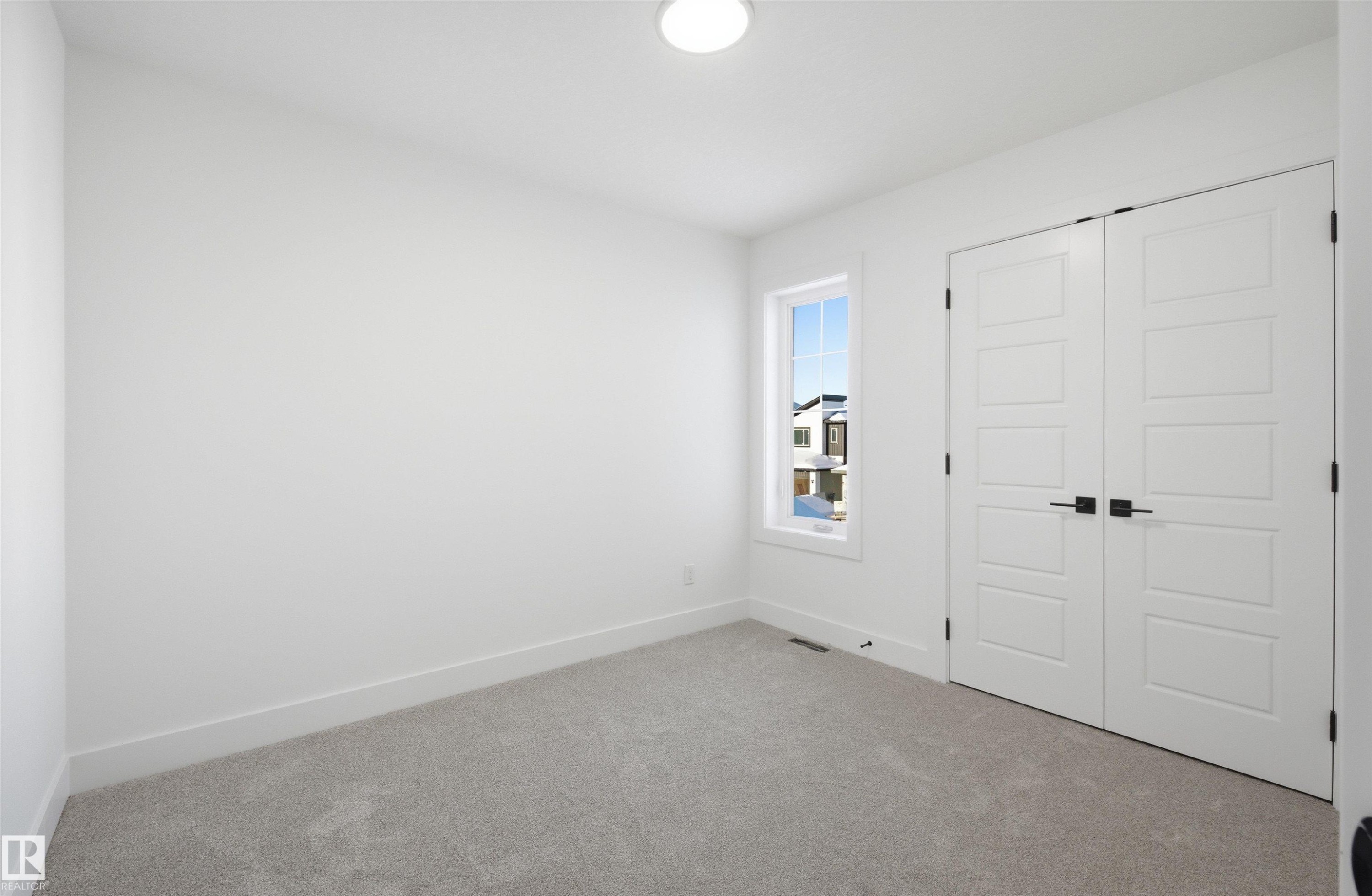 65 Silverstone Drive, Stony Plain, AB - Indoor Photo Showing Other Room