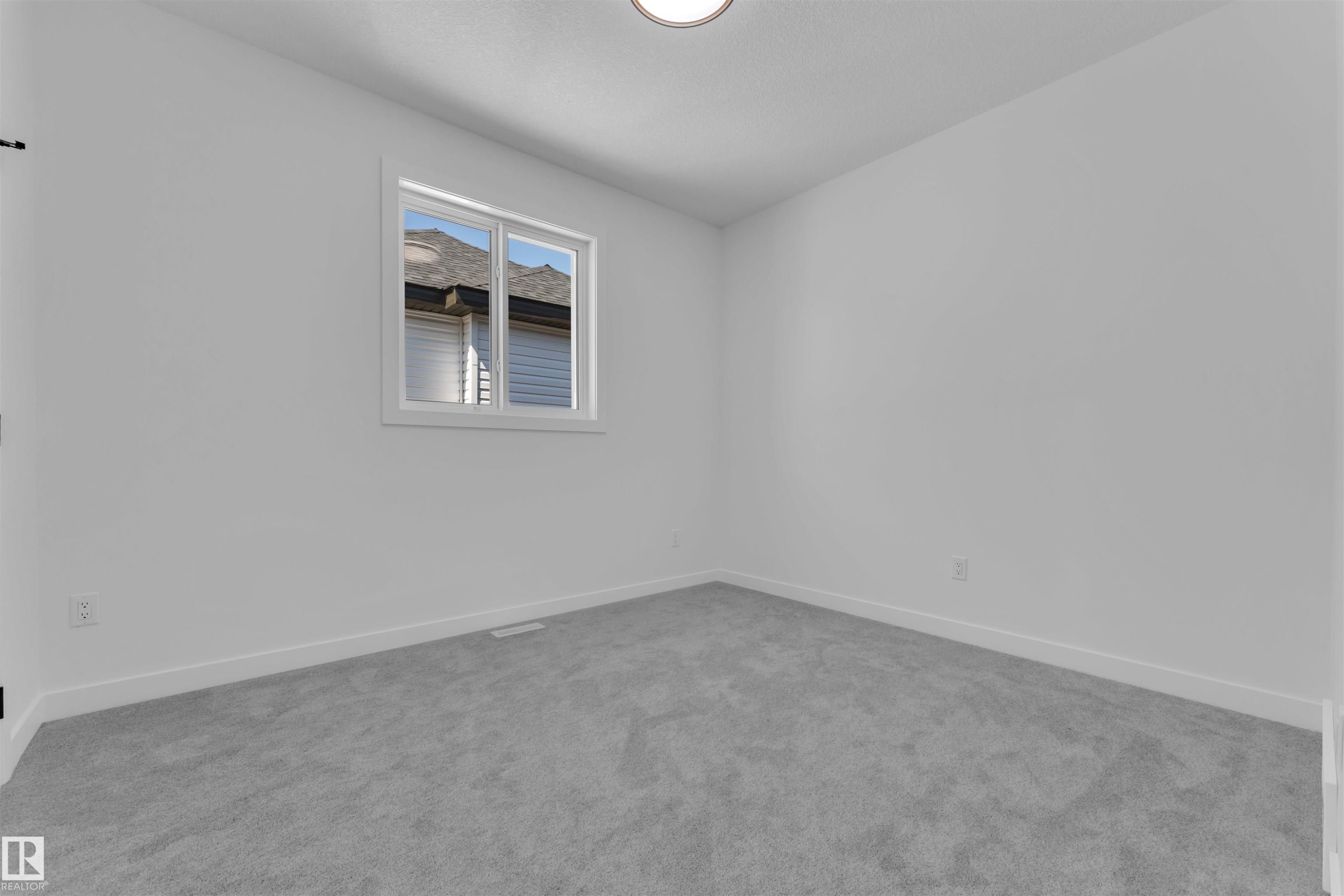 121 Lilac Close, Leduc, AB - Indoor Photo Showing Other Room