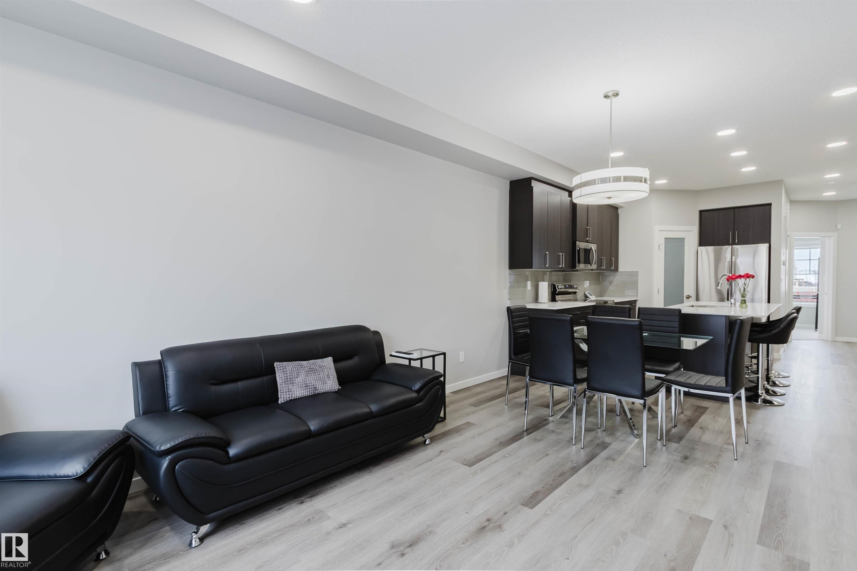 Living area with recessed lighting and light wood finished floors - 343 Edgemont Drive, Edmonton, AB - Indoor