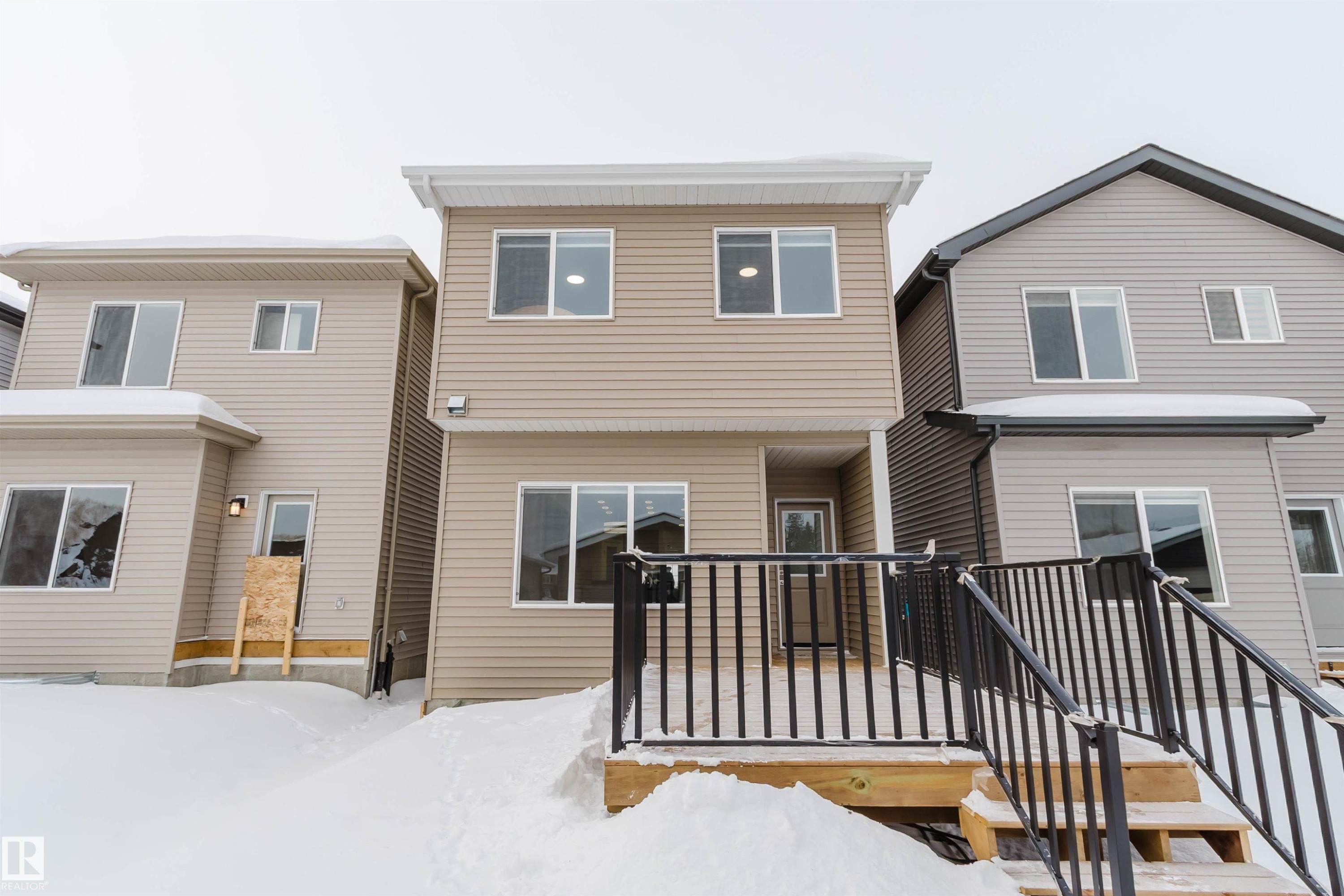 View of front of house featuring a wooden deck - 343 Edgemont Drive, Edmonton, AB - Outdoor