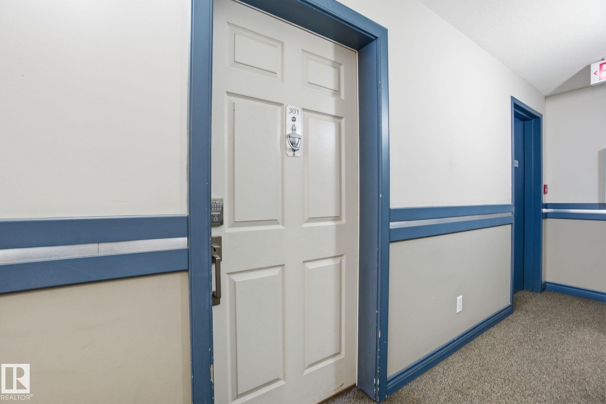 Doorway to property - 301 9603 98 Avenue, Edmonton, AB - Indoor Photo Showing Other Room