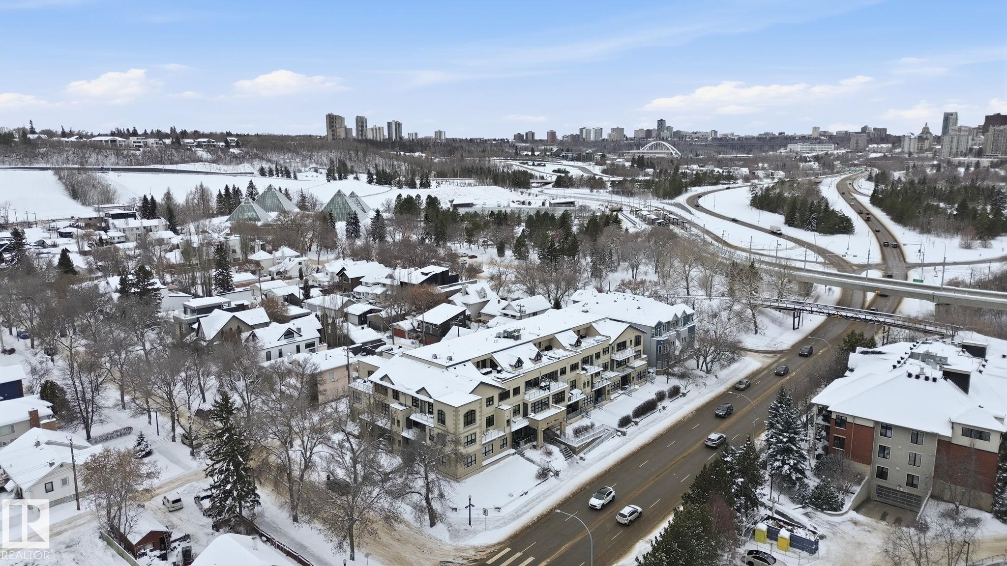 Snowy aerial view featuring a skyline view - 301 9603 98 Avenue, Edmonton, AB - Outdoor With View