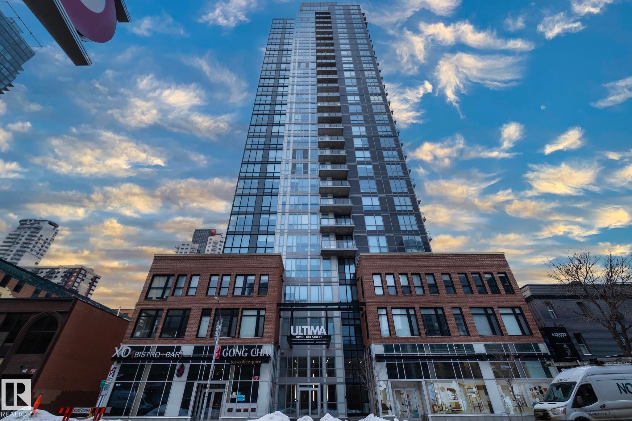 Property at dusk with a view of apartment building / complex - 1201 10238 103 Street, Edmonton, AB - Outdoor With Balcony With Facade