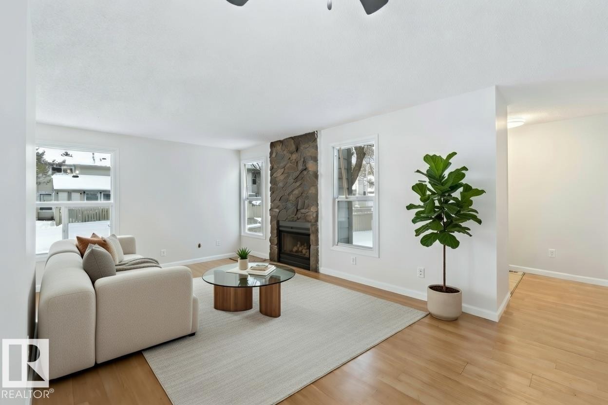 7026 Mill Woods Road S, Edmonton, AB - Indoor Photo Showing Living Room With Fireplace