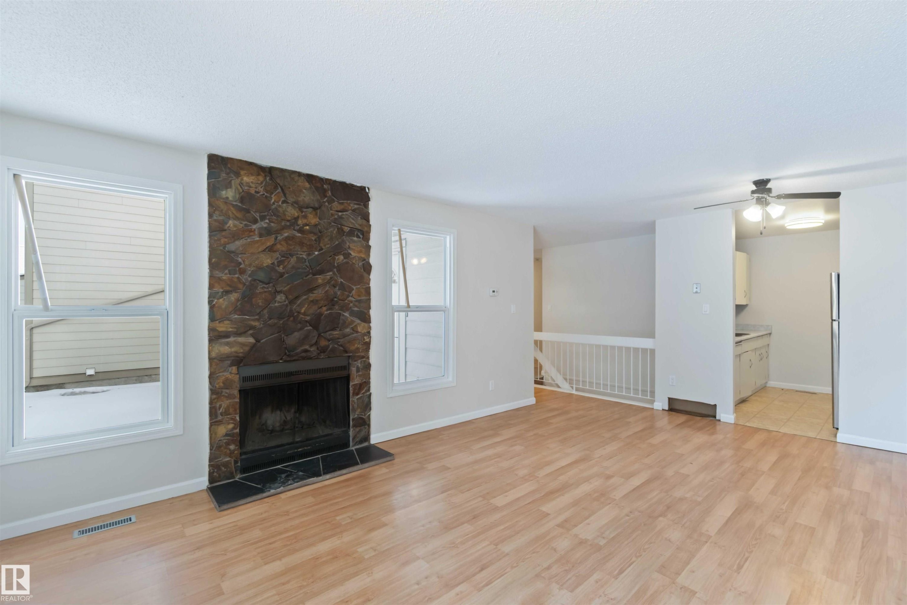 7026 Mill Woods Road S, Edmonton, AB - Indoor Photo Showing Living Room With Fireplace