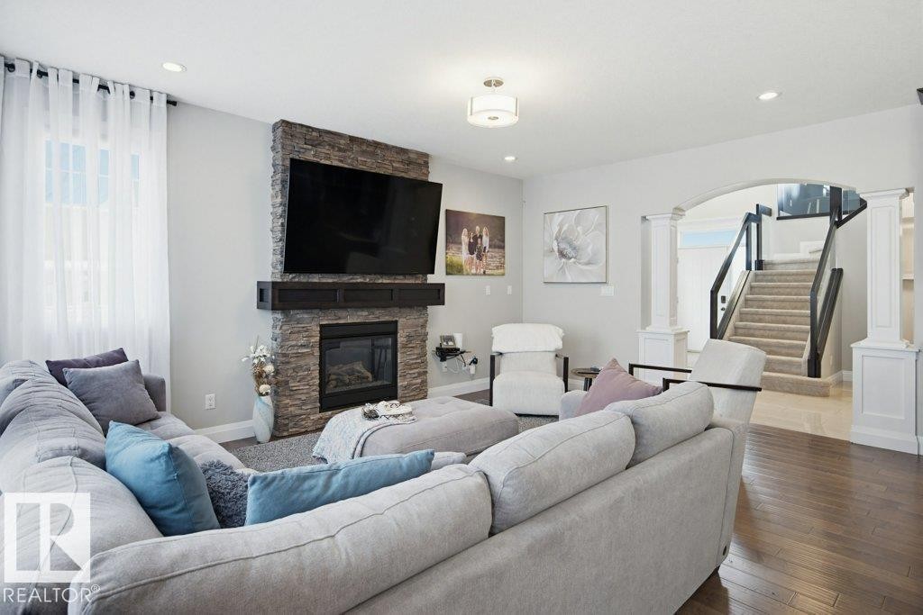2603 Bluejay Close, Edmonton, AB - Indoor Photo Showing Living Room With Fireplace