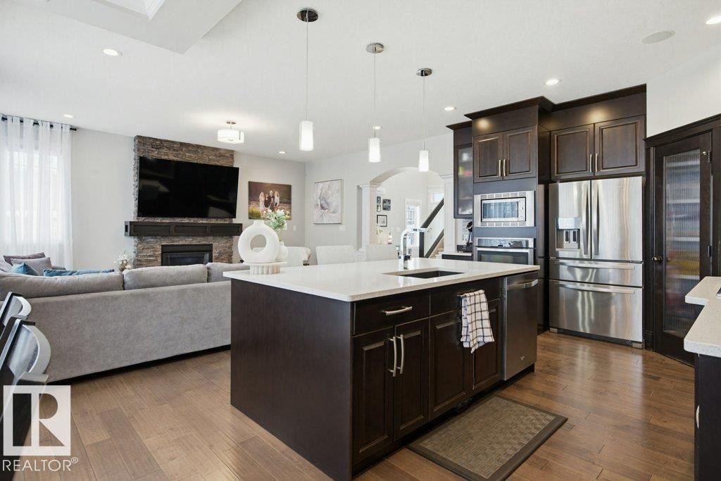 2603 Bluejay Close, Edmonton, AB - Indoor Photo Showing Kitchen With Fireplace With Stainless Steel Kitchen With Upgraded Kitchen