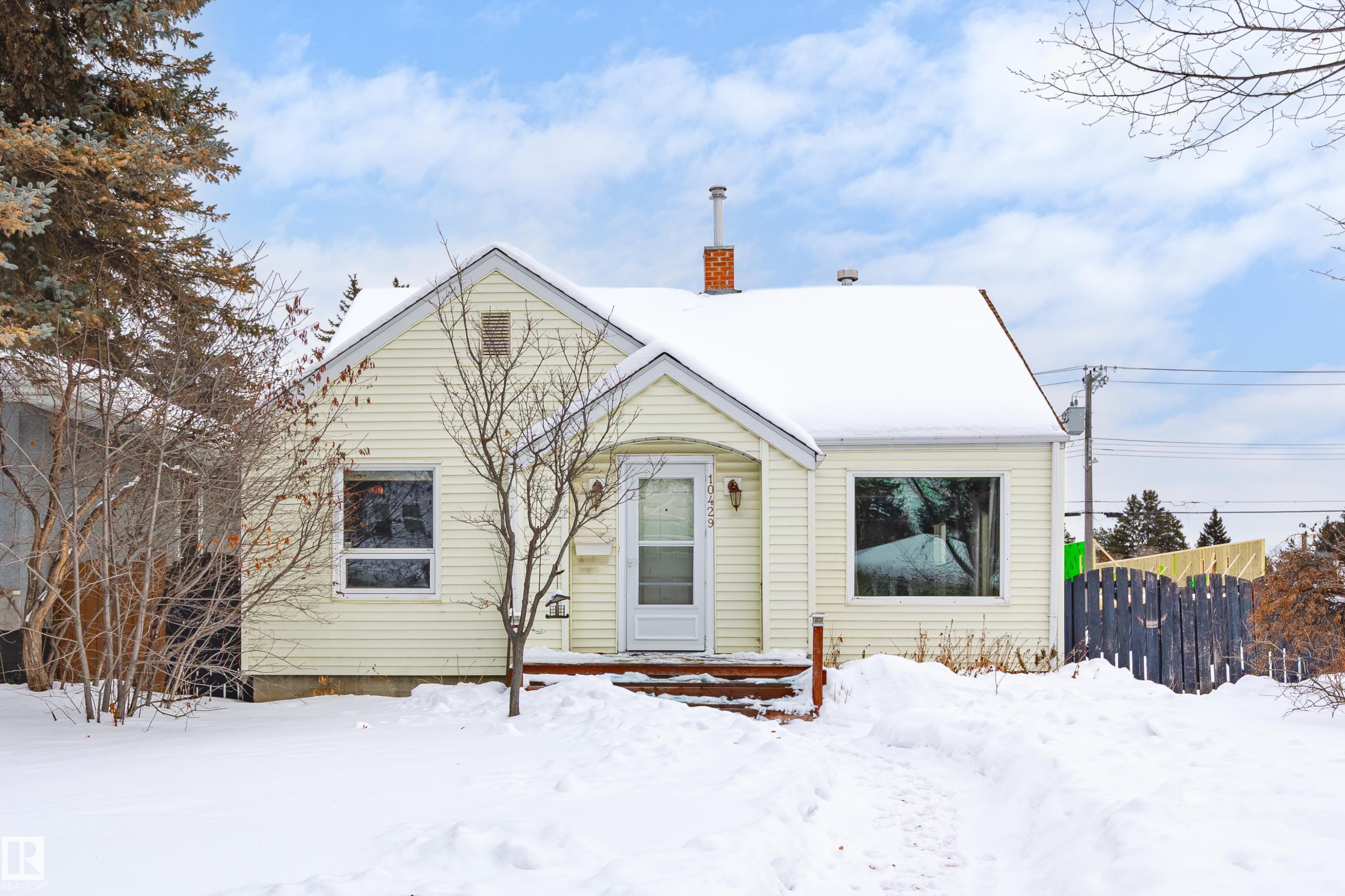 Bungalow-style home with a chimney - 10429 143 Street, Edmonton, AB - Outdoor