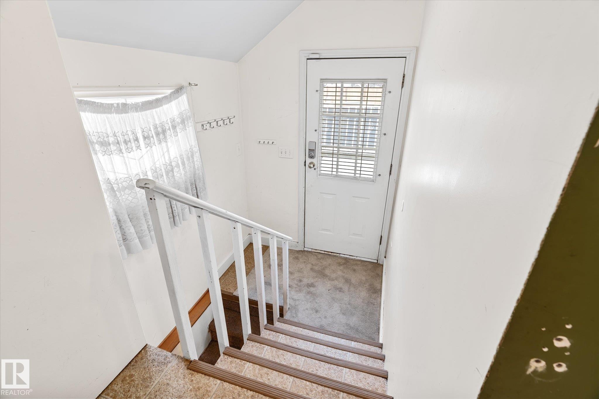 Stairs with carpet flooring - 10429 143 Street, Edmonton, AB - Indoor Photo Showing Other Room