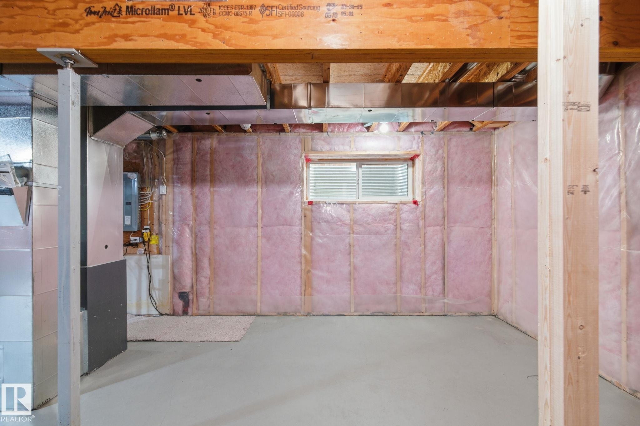 Below grade area with electric panel - 1511 Secord Rd, Edmonton, AB - Indoor Photo Showing Basement