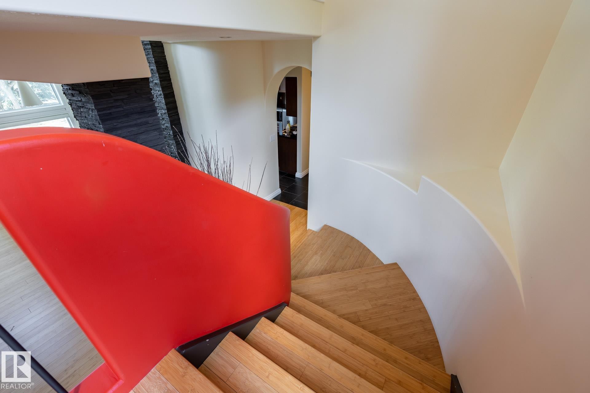 Stairs featuring arched walkways - 12428 103 Avenue Nw, Edmonton, AB - Indoor Photo Showing Other Room