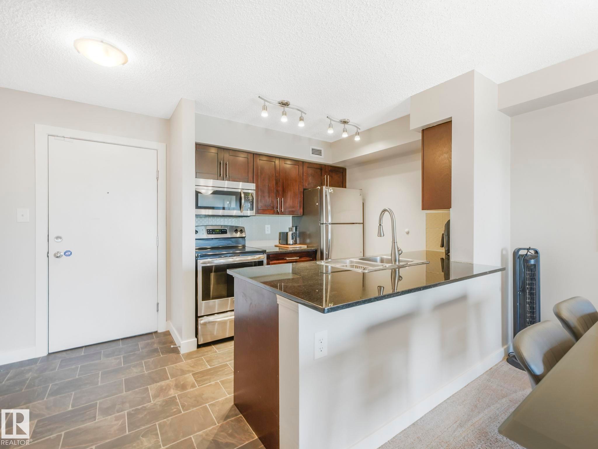 404 270 Mcconachie Drive, Edmonton, AB - Indoor Photo Showing Kitchen With Stainless Steel Kitchen