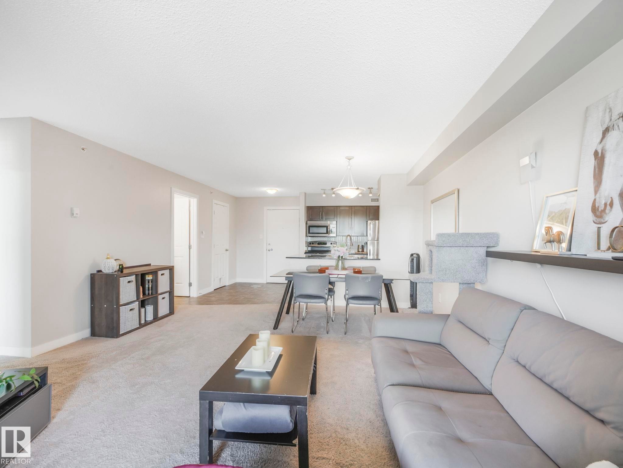 404 270 Mcconachie Drive, Edmonton, AB - Indoor Photo Showing Living Room