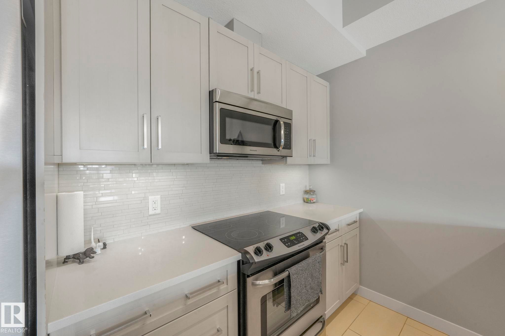 409 625 Leger Way, Edmonton, AB - Indoor Photo Showing Kitchen With Upgraded Kitchen