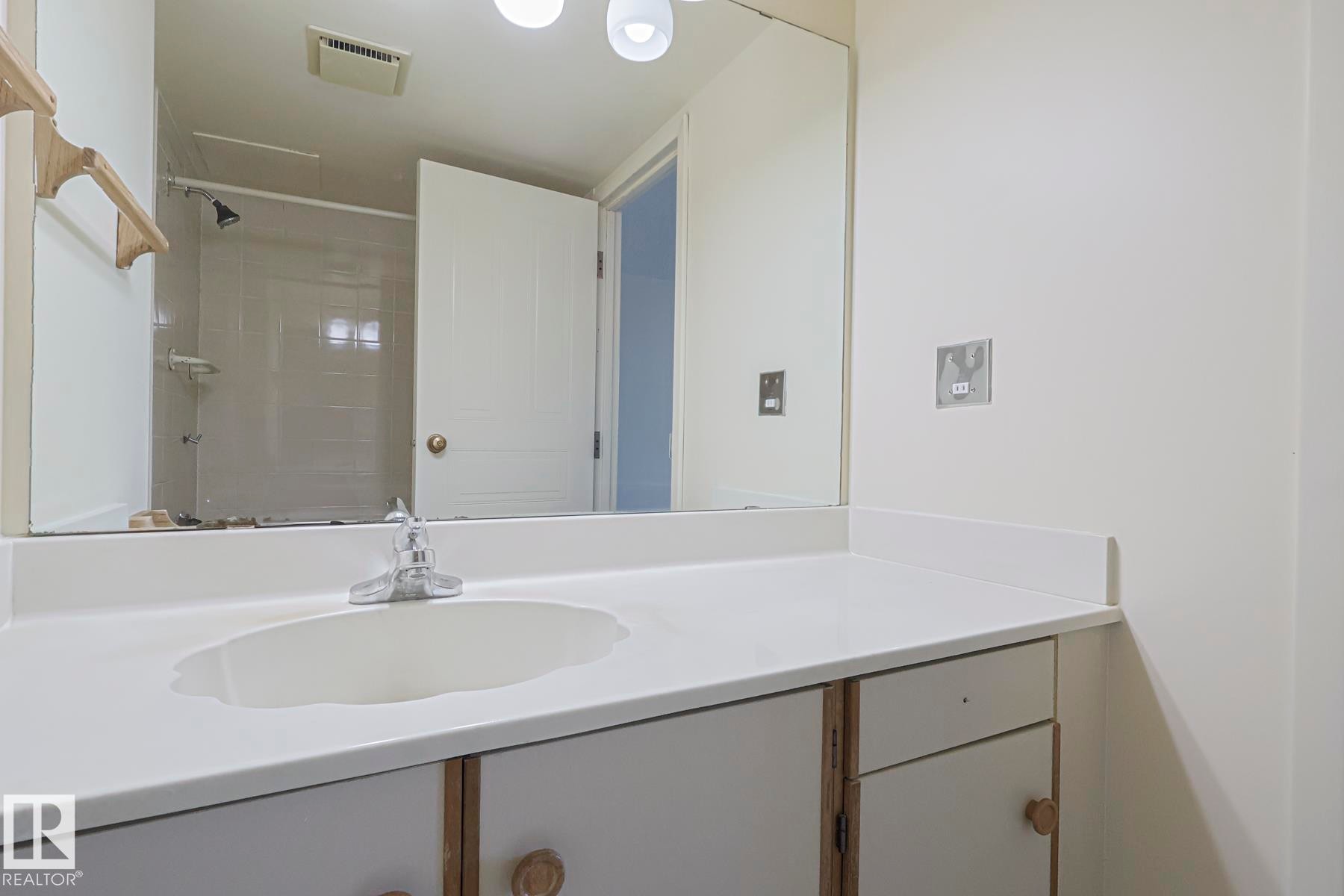 Full bathroom with vanity and a shower - 302 8340 Jasper Avenue Nw, Edmonton, AB - Indoor Photo Showing Bathroom