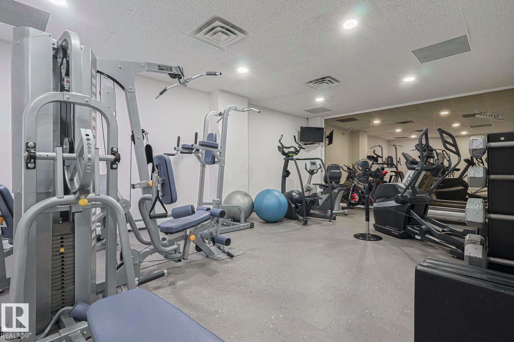 Exercise room featuring recessed lighting and a textured ceiling - 302 8340 Jasper Avenue Nw, Edmonton, AB - Indoor Photo Showing Gym Room
