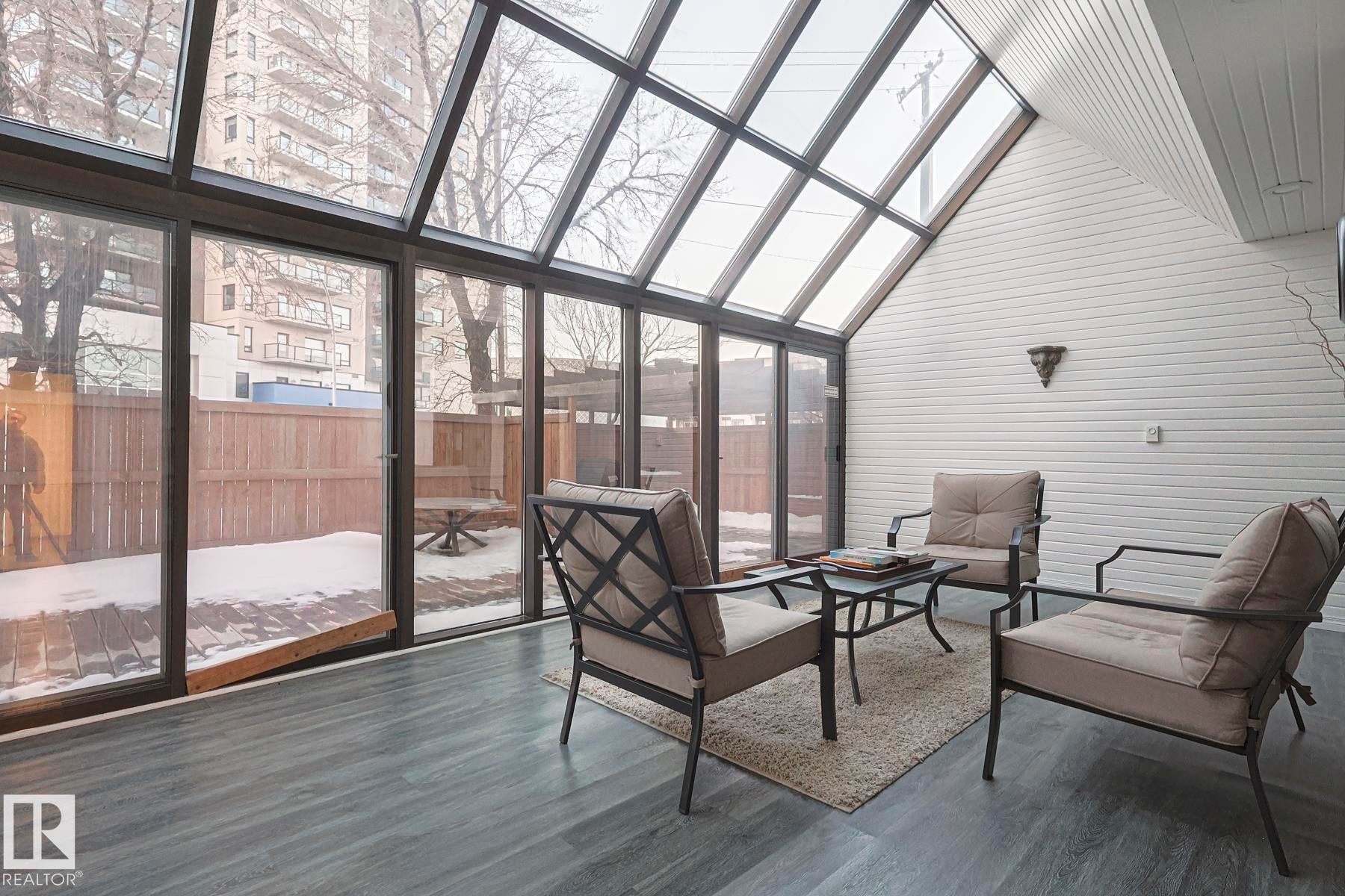 Sunroom / solarium with a skylight and vaulted ceiling - 302 8340 Jasper Avenue Nw, Edmonton, AB - Indoor Photo Showing Other Room