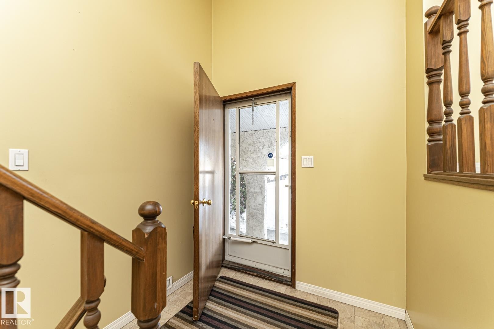 Foyer featuring stairs and baseboards - 10207 165 Avenue, Edmonton, AB - Indoor Photo Showing Other Room