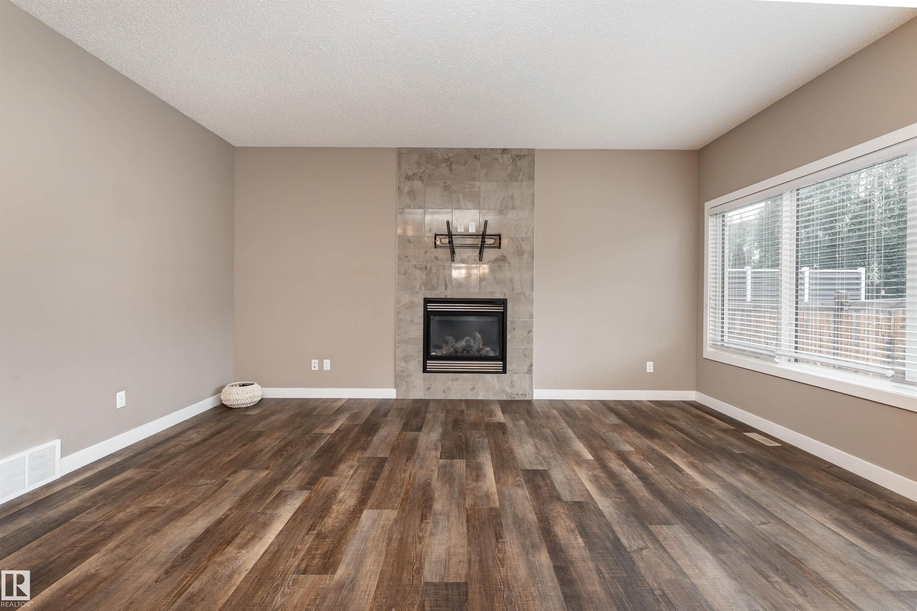 2211 Calhoun Link, Edmonton, AB - Indoor Photo Showing Living Room With Fireplace