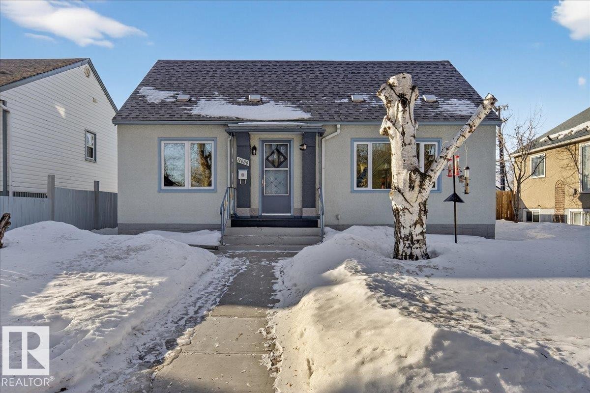 View of front of property featuring a shingled roof and stucco siding - 11630 71 Street, Edmonton, AB - Outdoor With Facade