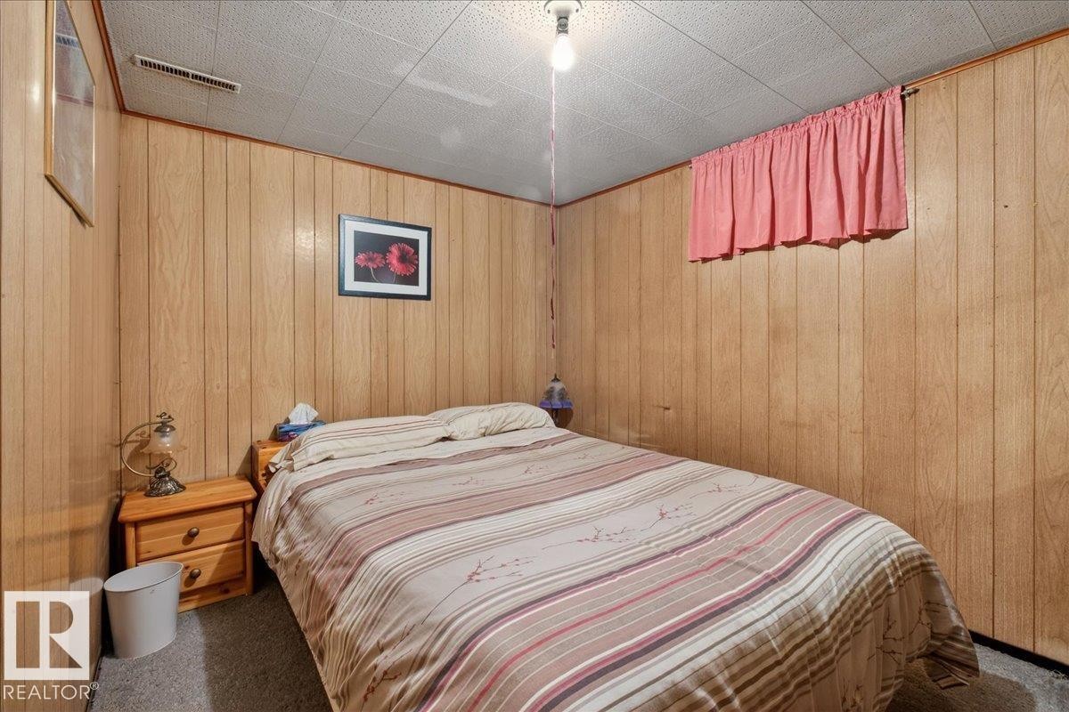 View of carpeted bedroom - 11630 71 Street, Edmonton, AB - Indoor Photo Showing Bedroom