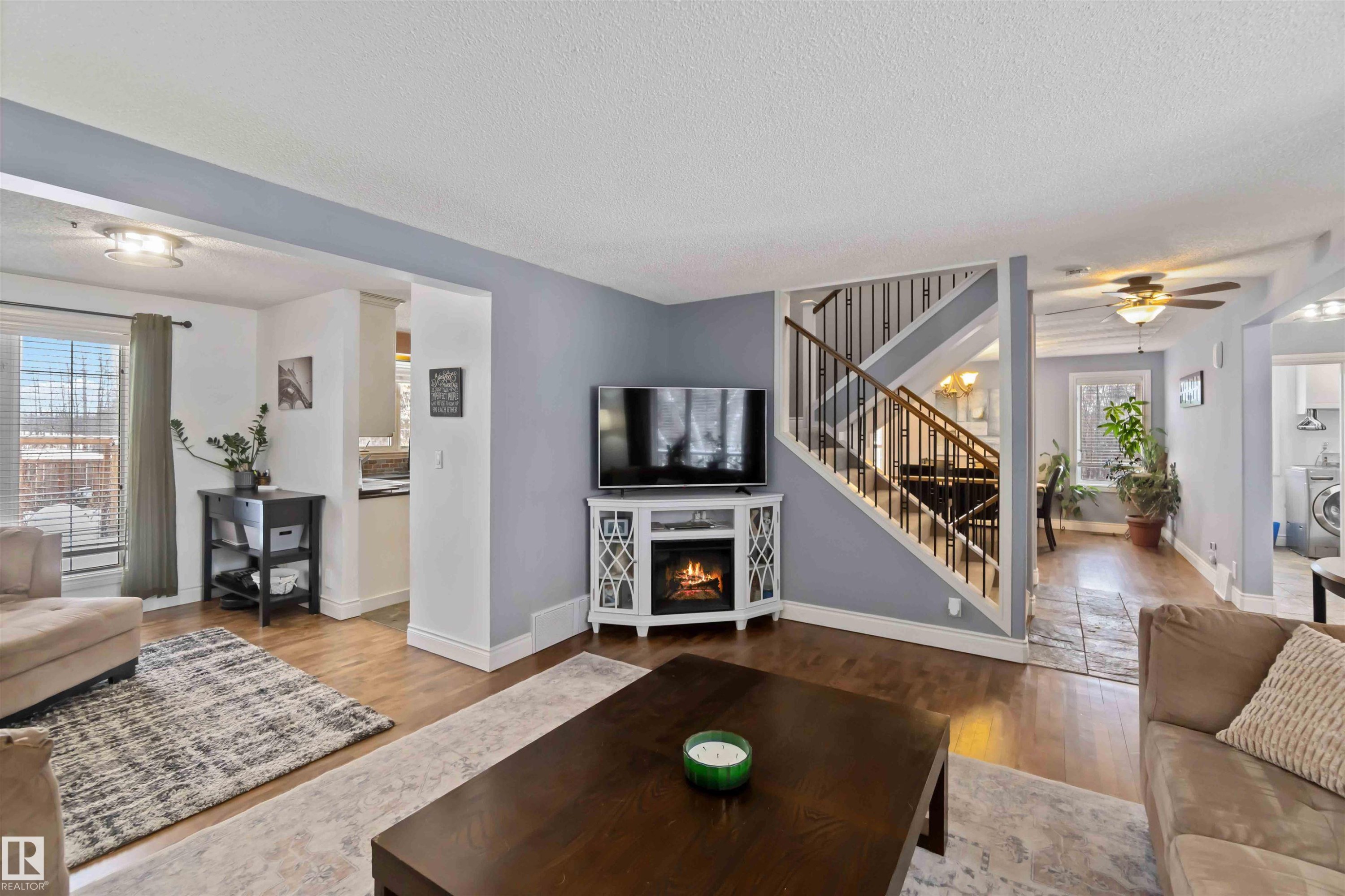 501 Lakeside Drive, Rural Parkland County, AB - Indoor Photo Showing Living Room With Fireplace