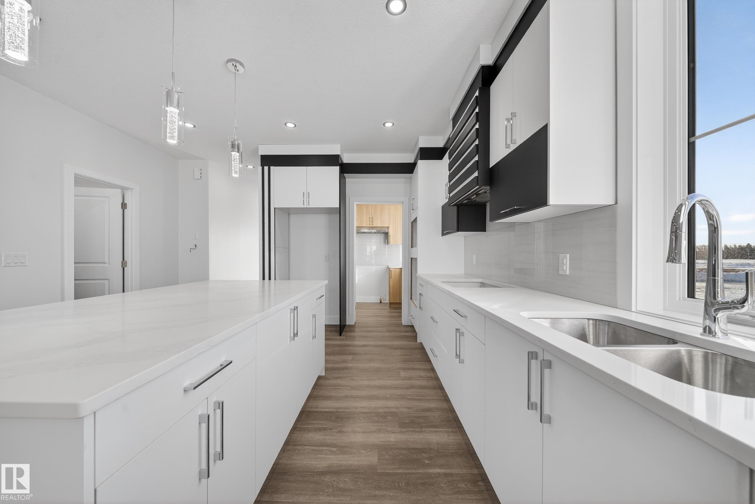 464 Crystal Creek Link, Leduc, AB - Indoor Photo Showing Kitchen With Double Sink With Upgraded Kitchen