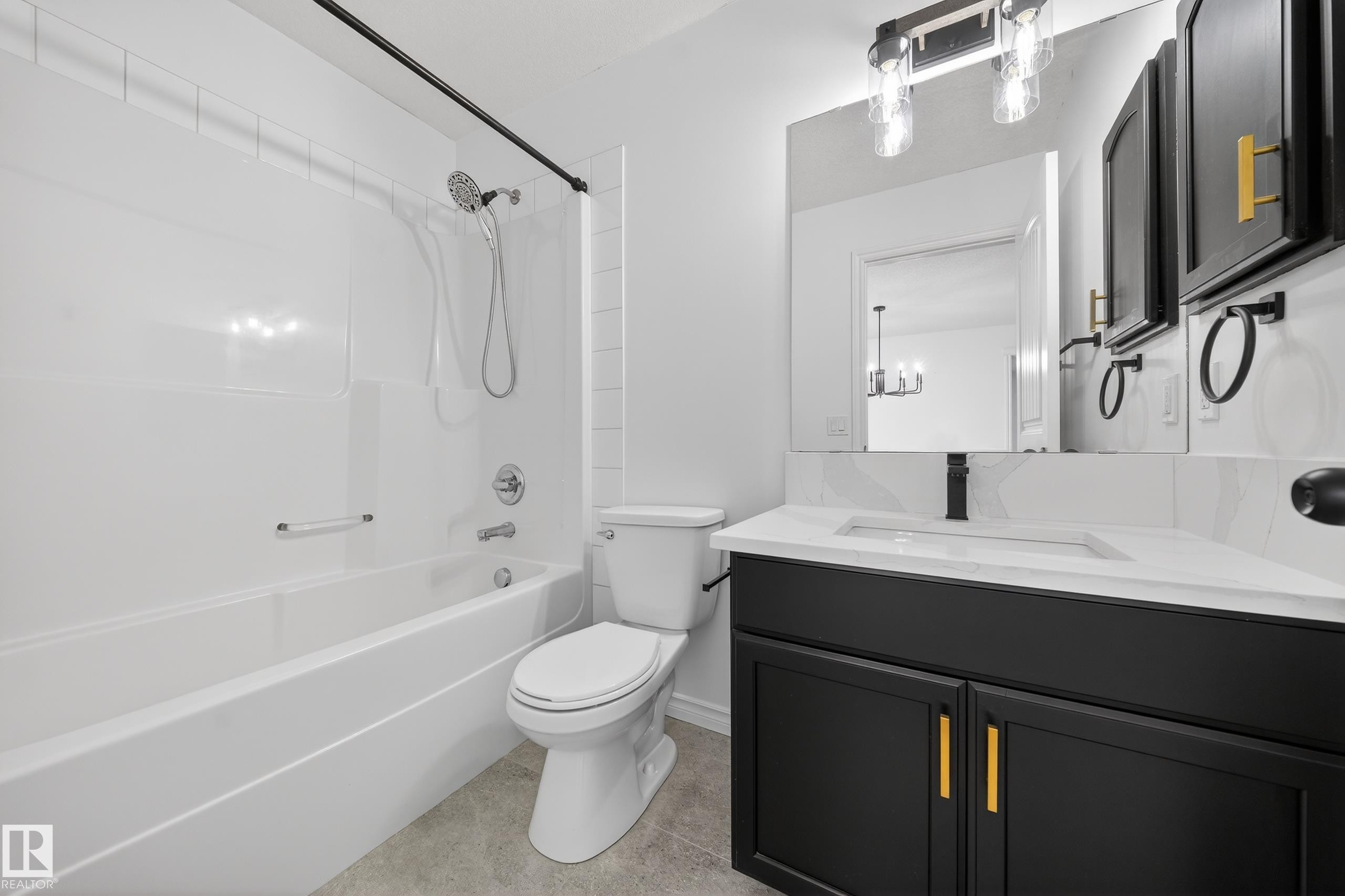 Bathroom featuring vanity and washtub / shower combination - 1741 63A Street, Edmonton, AB - Indoor Photo Showing Bathroom