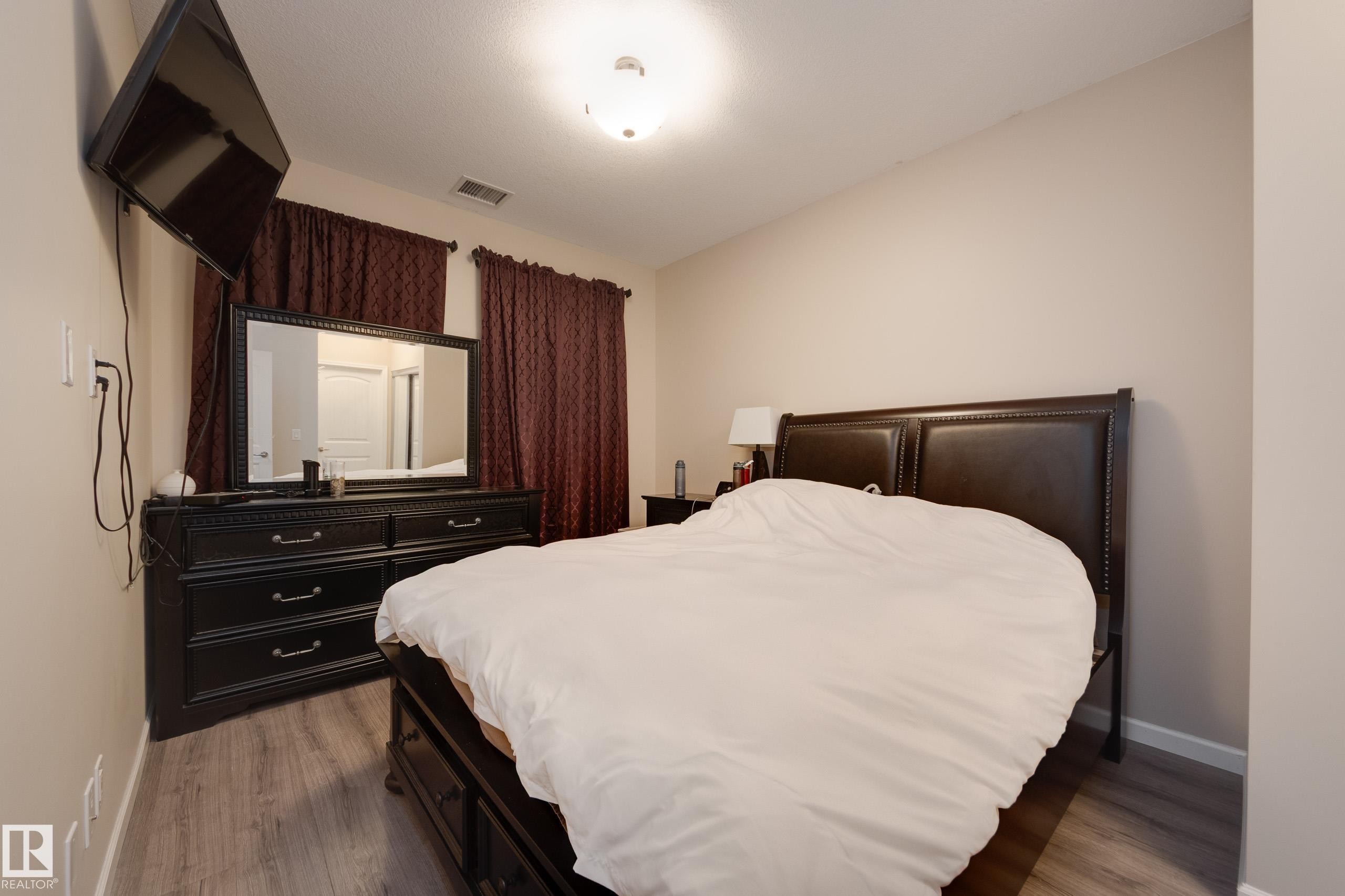 317 6083 Maynard Way, Edmonton, AB - Indoor Photo Showing Bedroom