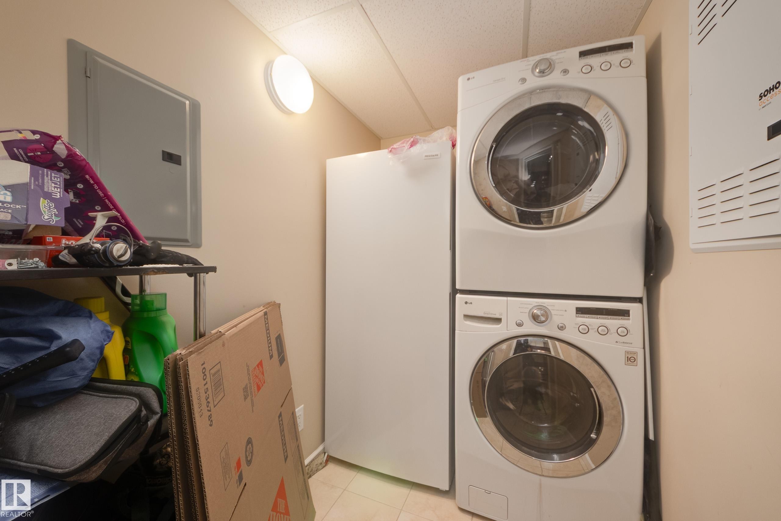 317 6083 Maynard Way, Edmonton, AB - Indoor Photo Showing Laundry Room