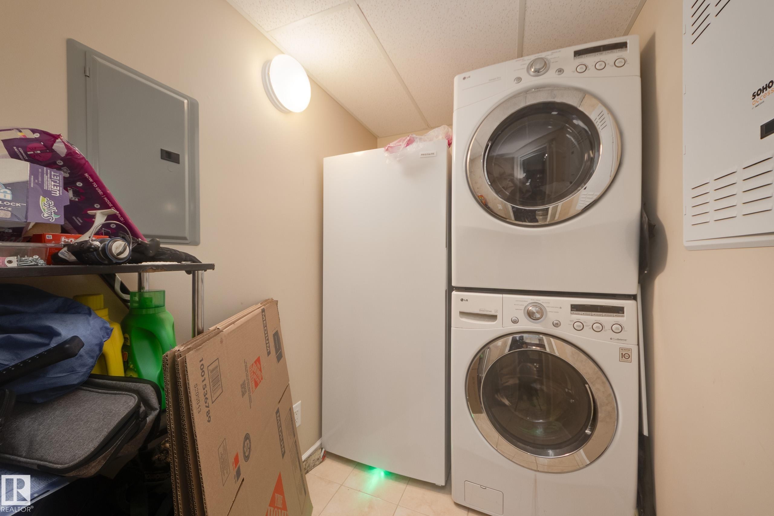 317 6083 Maynard Way, Edmonton, AB - Indoor Photo Showing Laundry Room