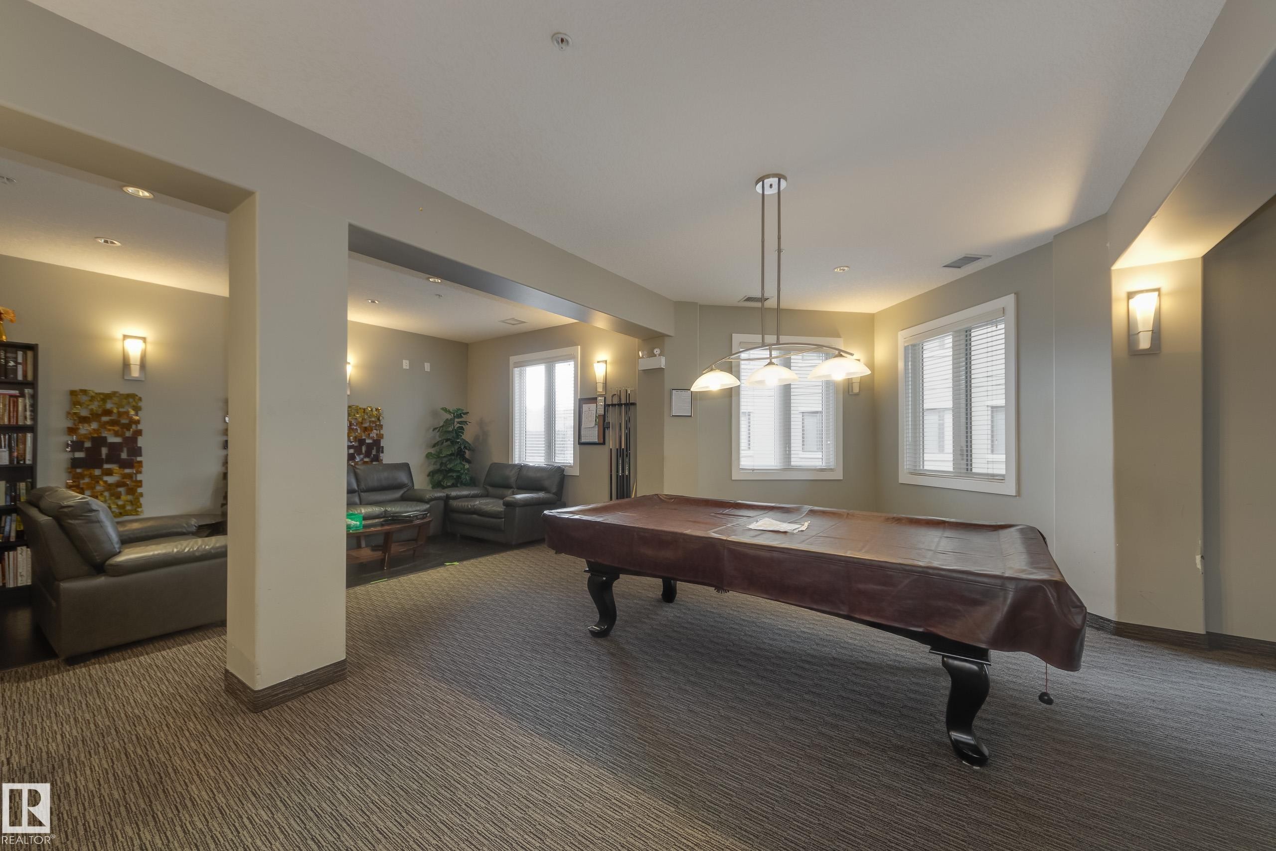 317 6083 Maynard Way, Edmonton, AB - Indoor Photo Showing Other Room