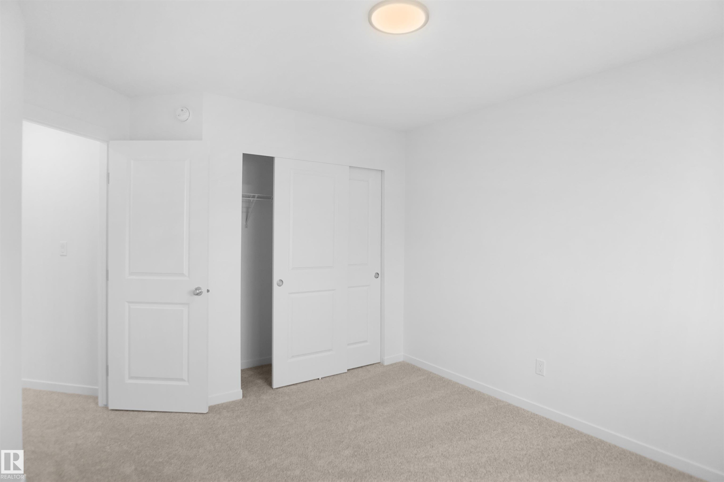 57 19904 31 Avenue, Edmonton, AB - Indoor Photo Showing Other Room