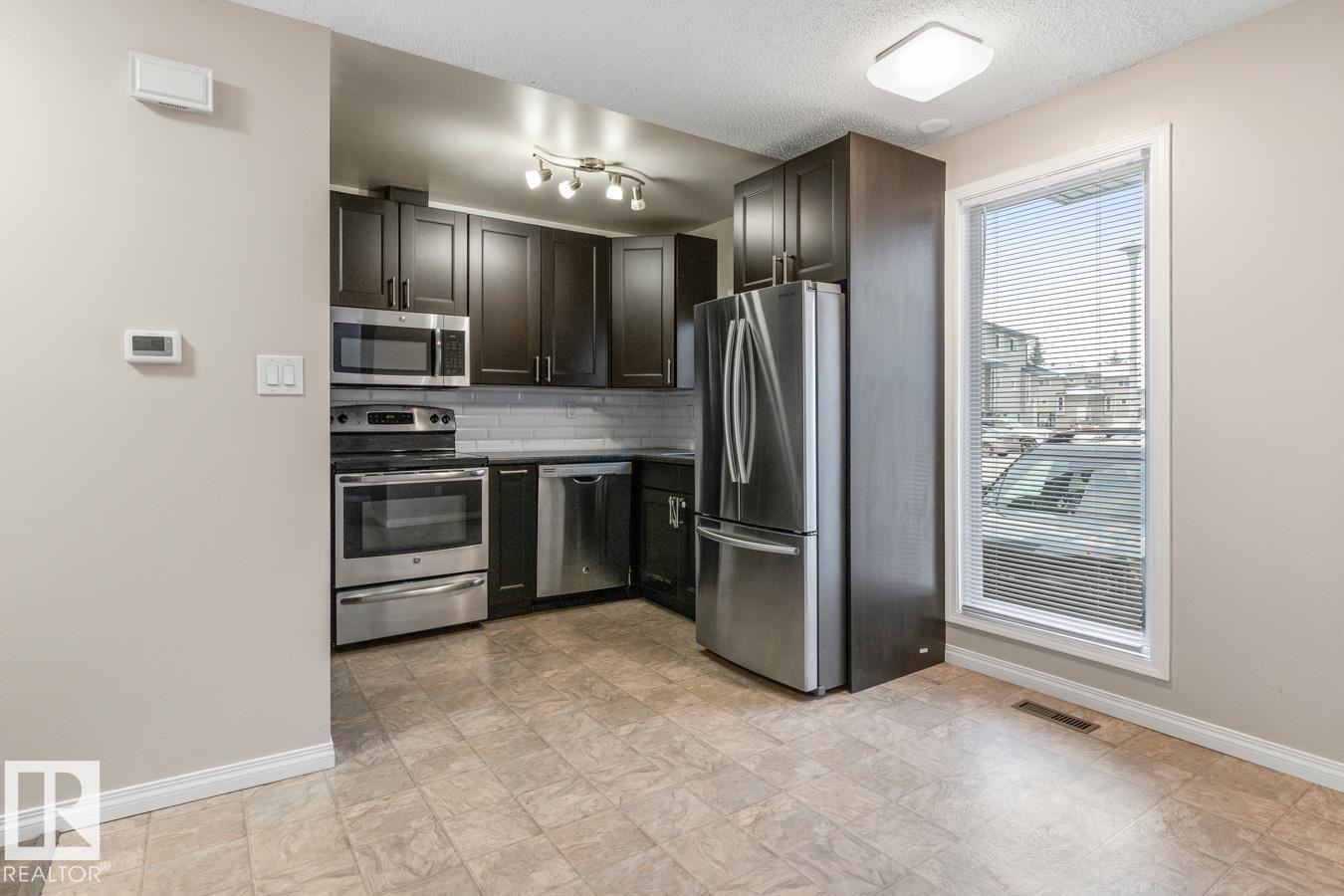 5346 38A Avenue, Edmonton, AB - Indoor Photo Showing Kitchen With Stainless Steel Kitchen