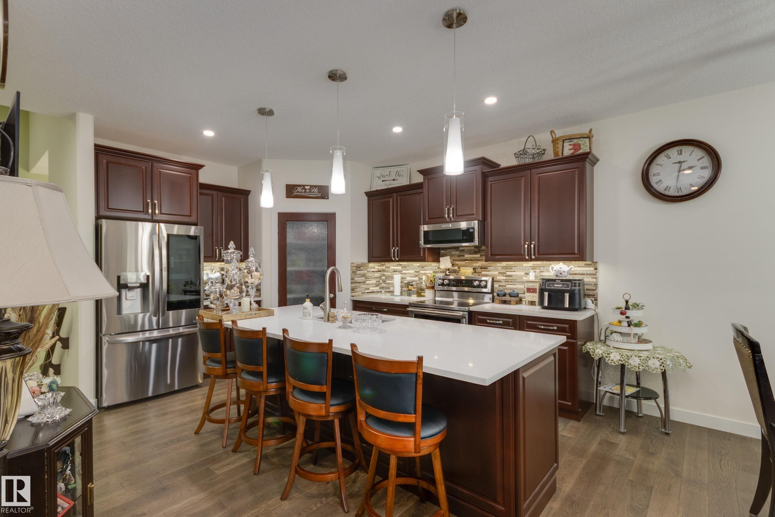 64 Maple Crescent, Gibbons, AB - Indoor Photo Showing Kitchen With Upgraded Kitchen
